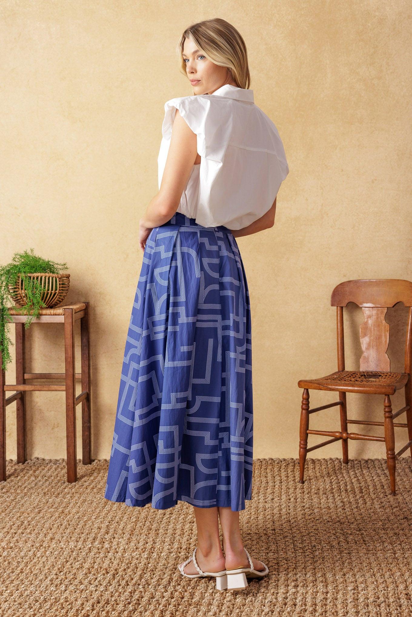 LEAVES OF TOMORROW WOVEN MIDI SKIRT.