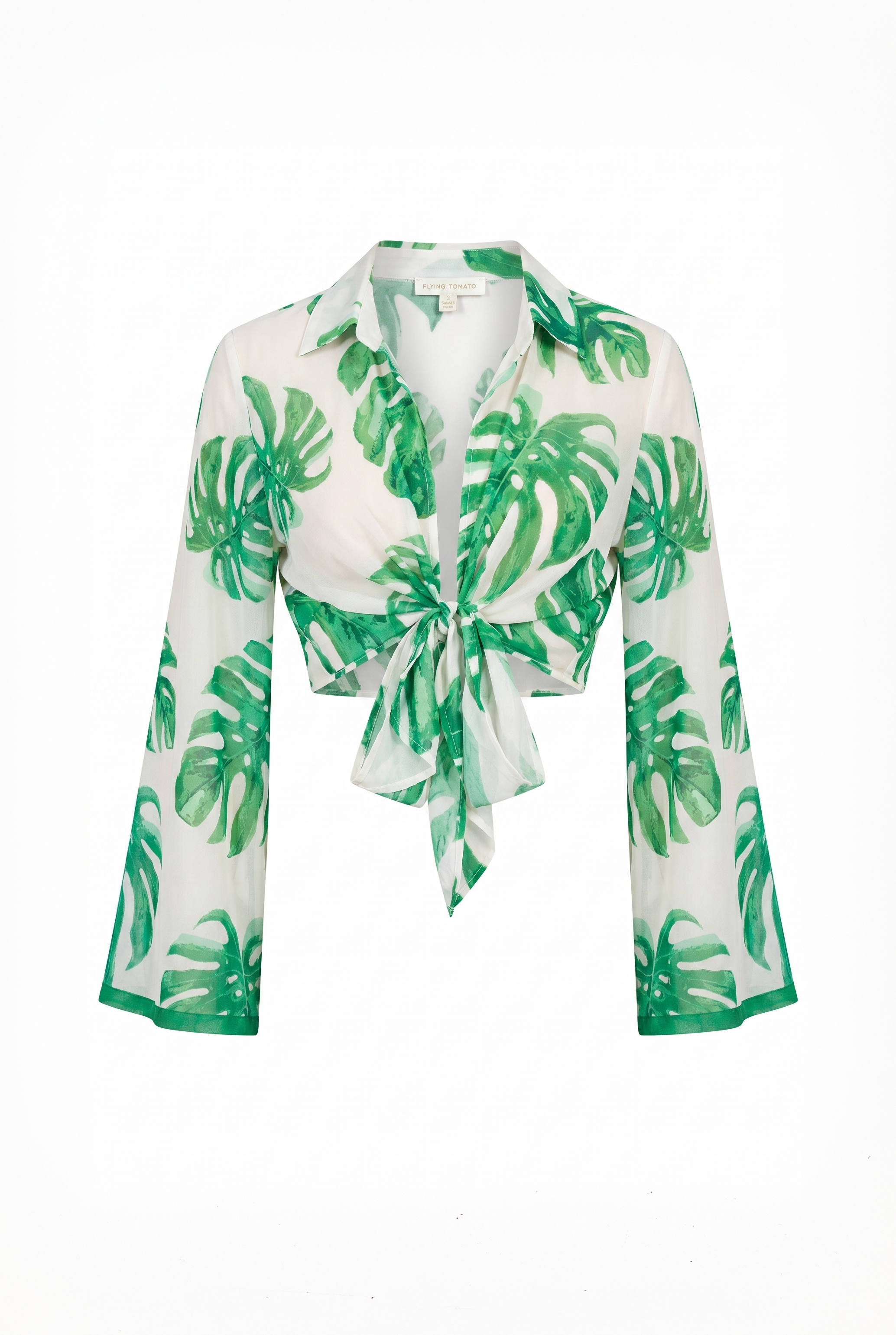 Green leaf-patterned shirt on a white background