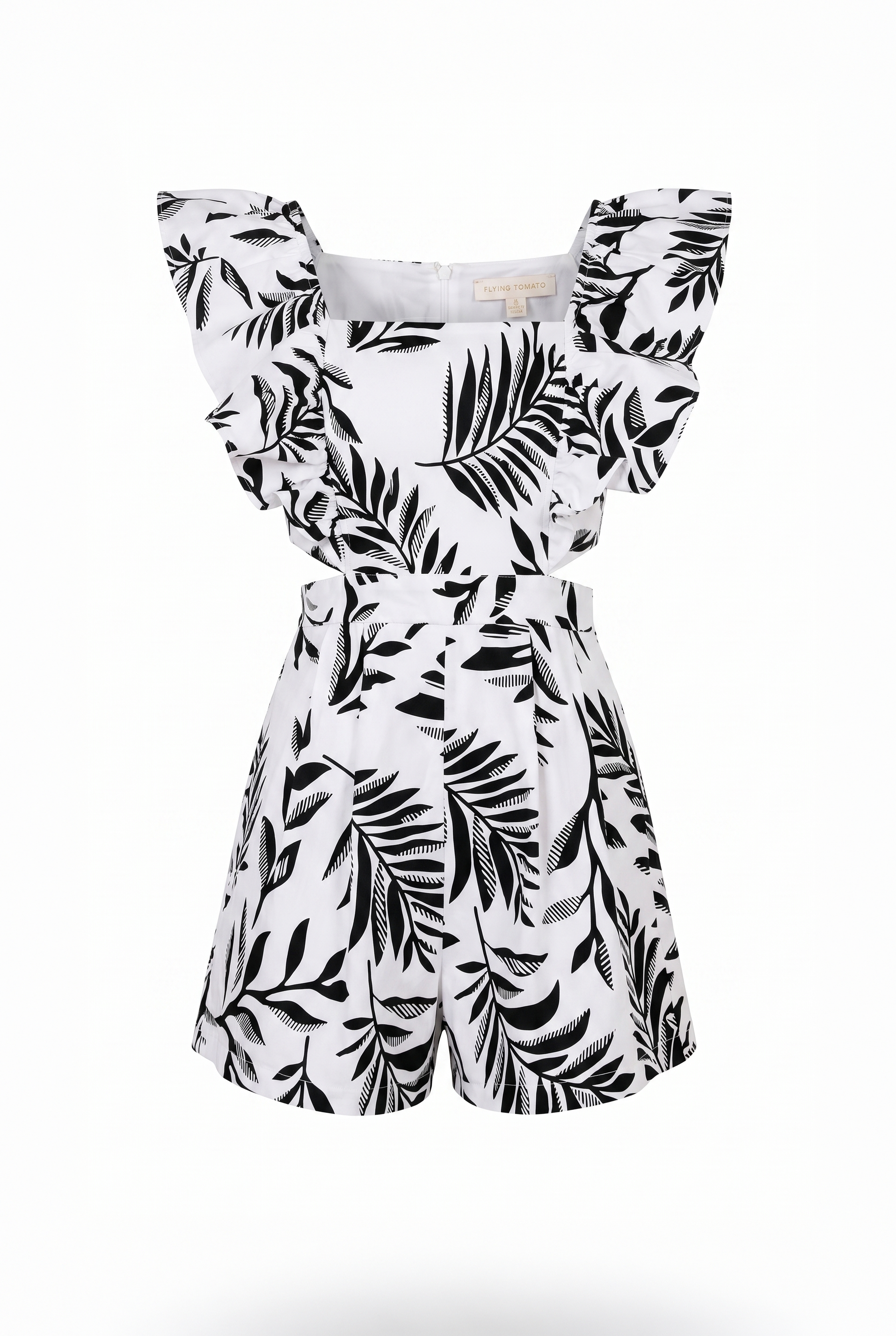 White romper with black leaf pattern on a white background