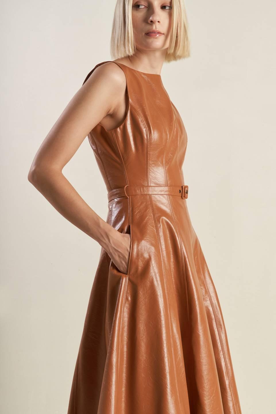 LUNAR SYMPHONY FAUX LEATHER MIDI DRESS.