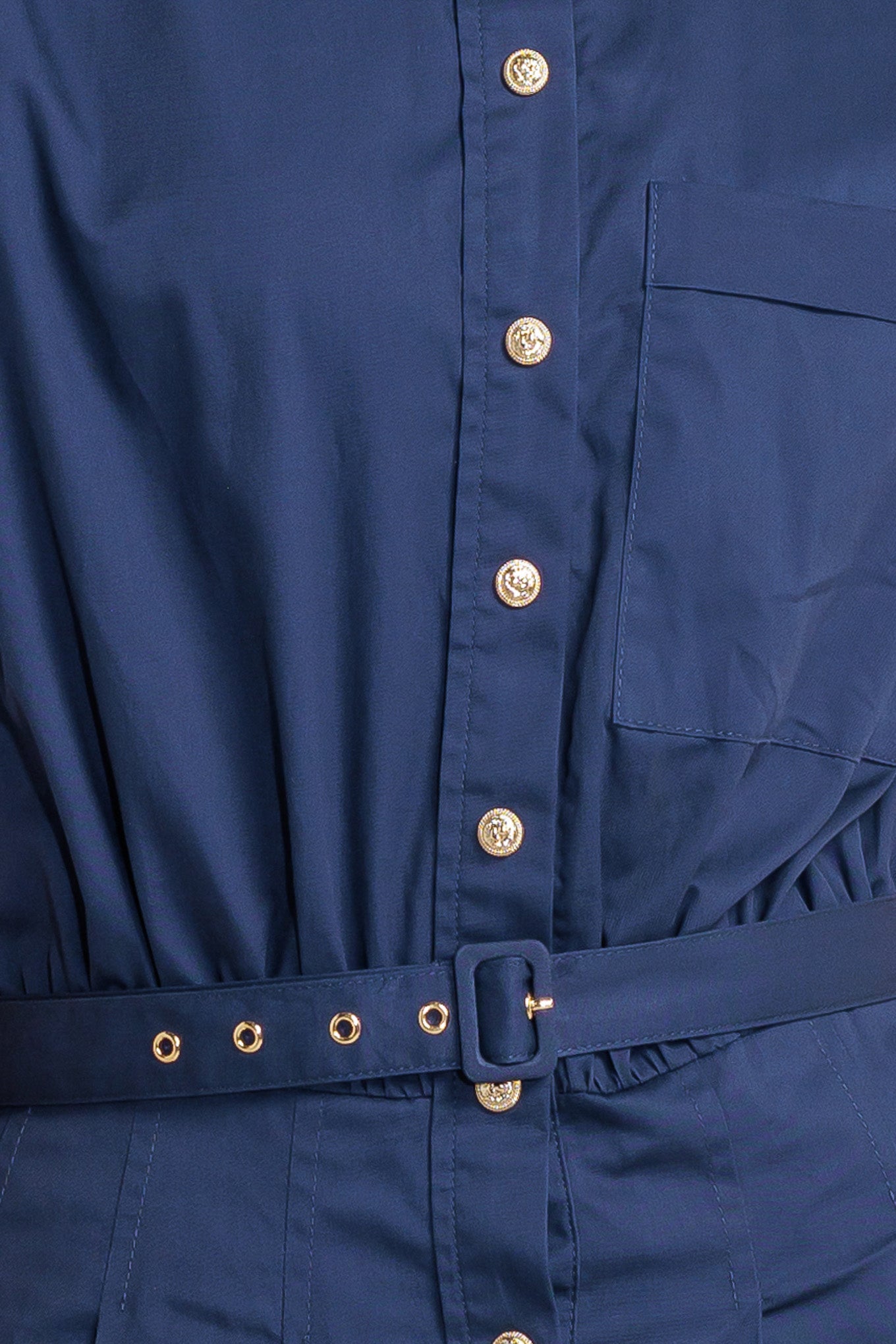 A solid woven midi dress featuring collar, short sleeve, front pocket, button down, self belt and full skirt