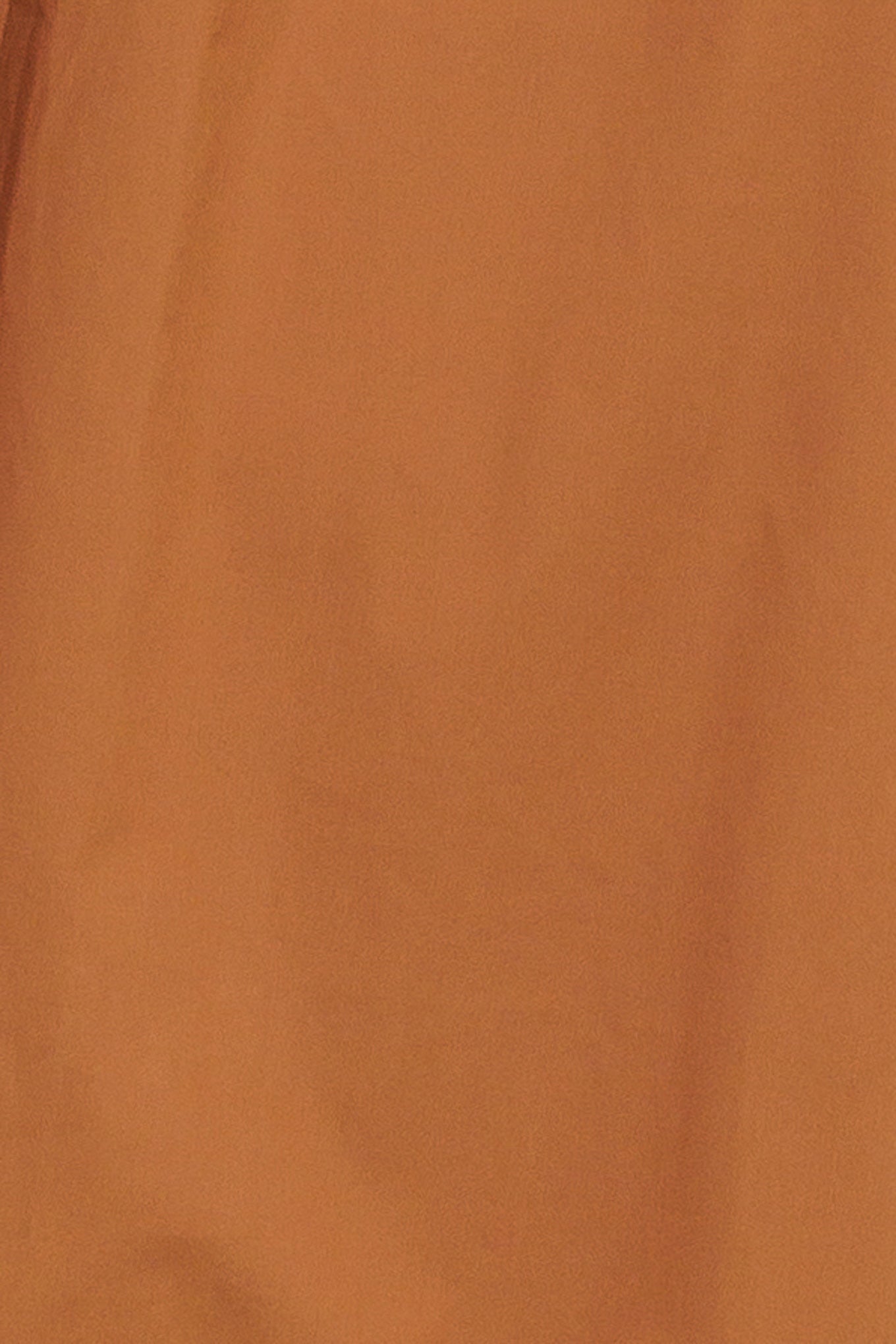 A solid woven midi dress featuring strapless with double flounce, contrasting belt and ruffled hemline