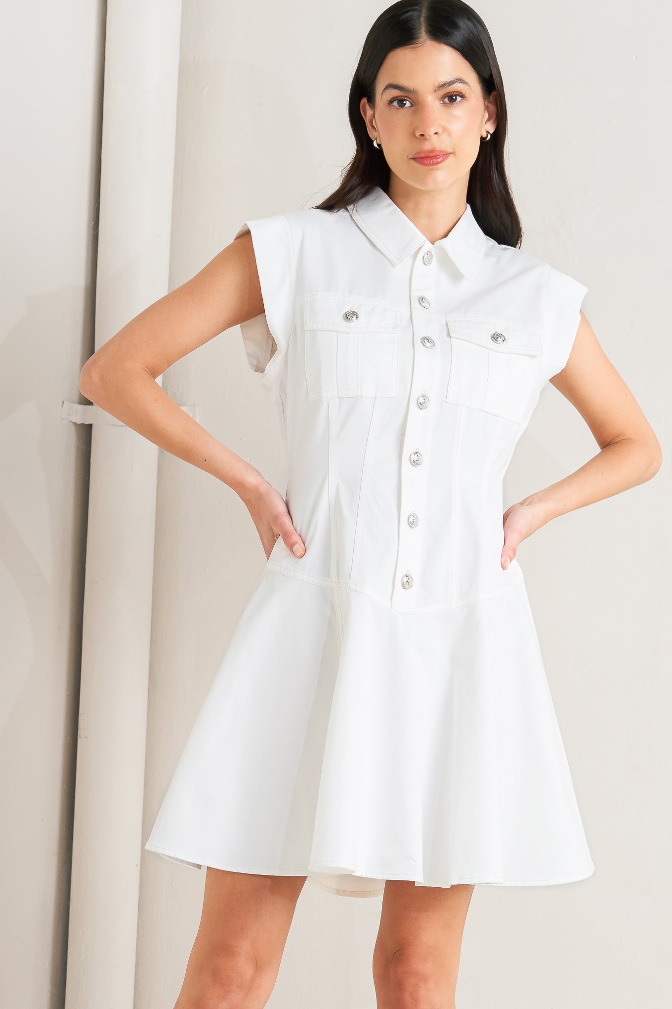 A solid woven mini dress featuring collar, short sleeve, front pocket, button down, drop waistline and circle skirt
Details:
Self: 100% Cotton
Size & Fit
- Model is 5`8" And Wearing Size Small
- Measurements Taken From Size Small
- Approx. Length: 34"