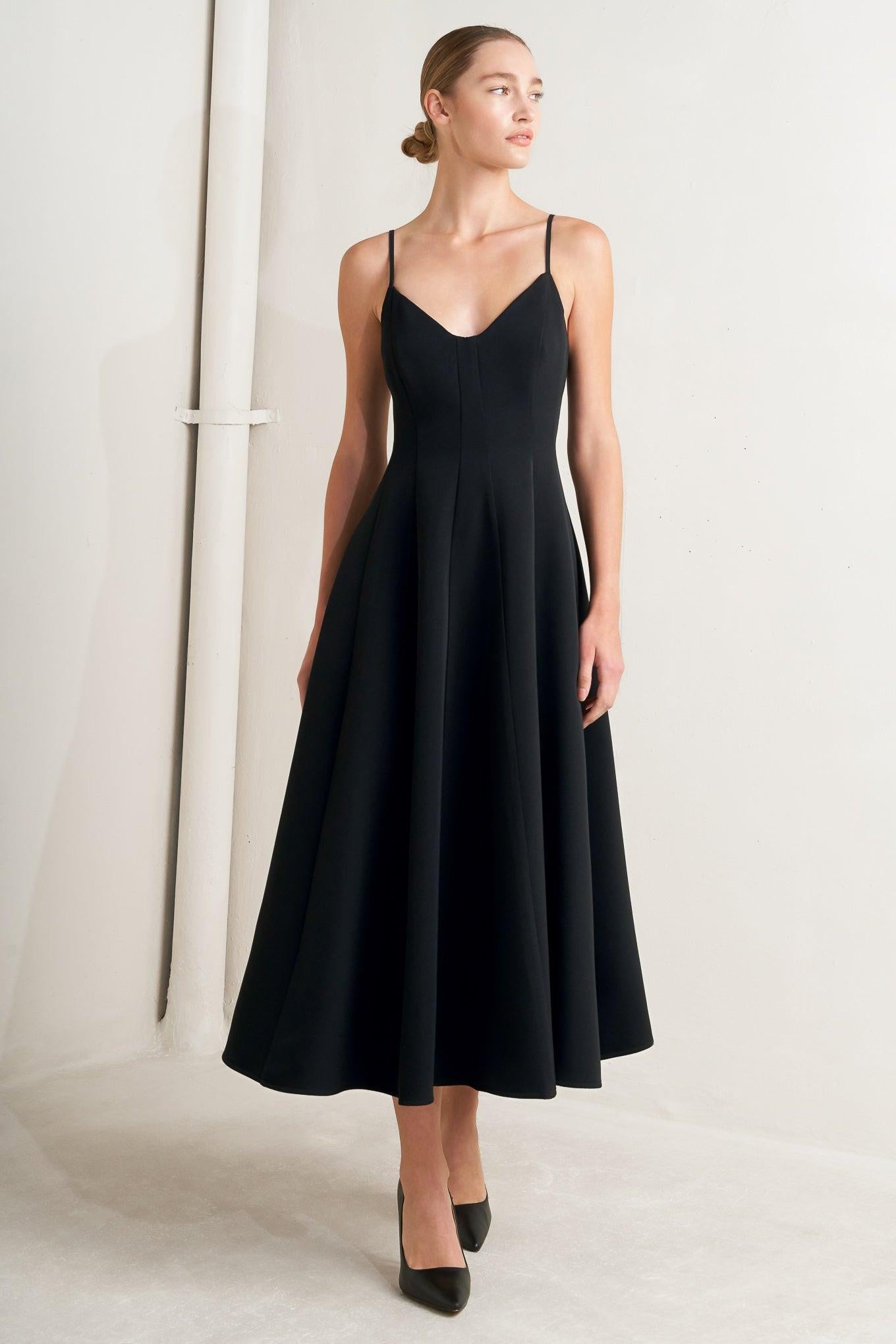 A solid woven midi dress featuring cami top, circle skirt, low back and zipper closure
Details:
Self: 95% Polyester 5% Spandex
Lining: 100% Polyester
Size & Fit
-Model is 5`8" And Wearing Size Small
-Measurements Taken From Size Small
-Approx. Length: 50"