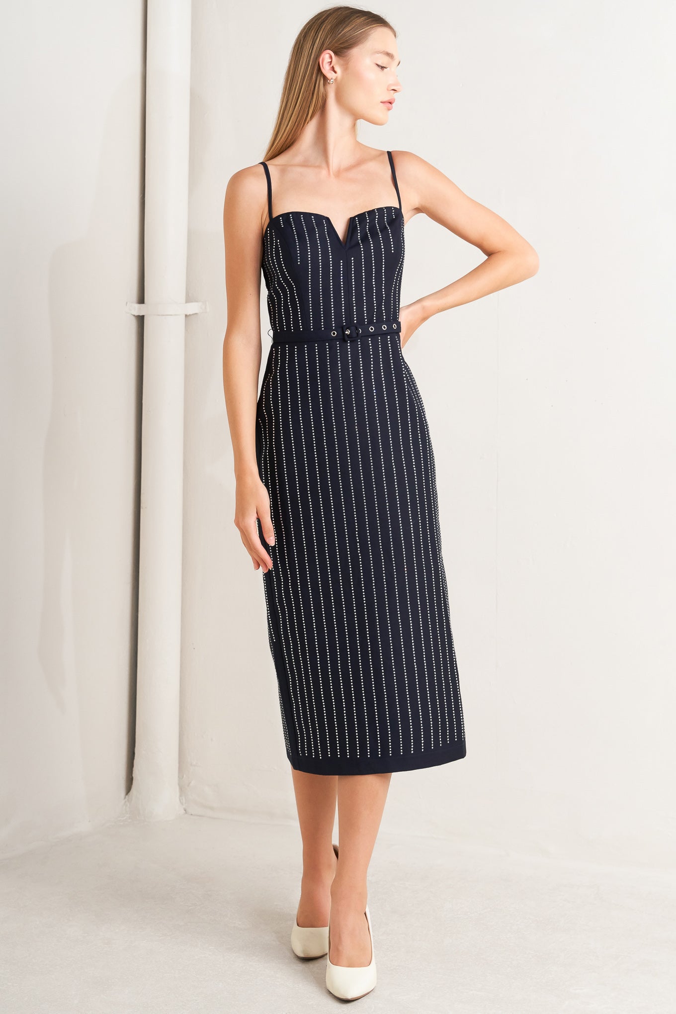 A solid woven midi dress with embellishment, sweetheart neckline, straps, pencil skirt and back zipper closure