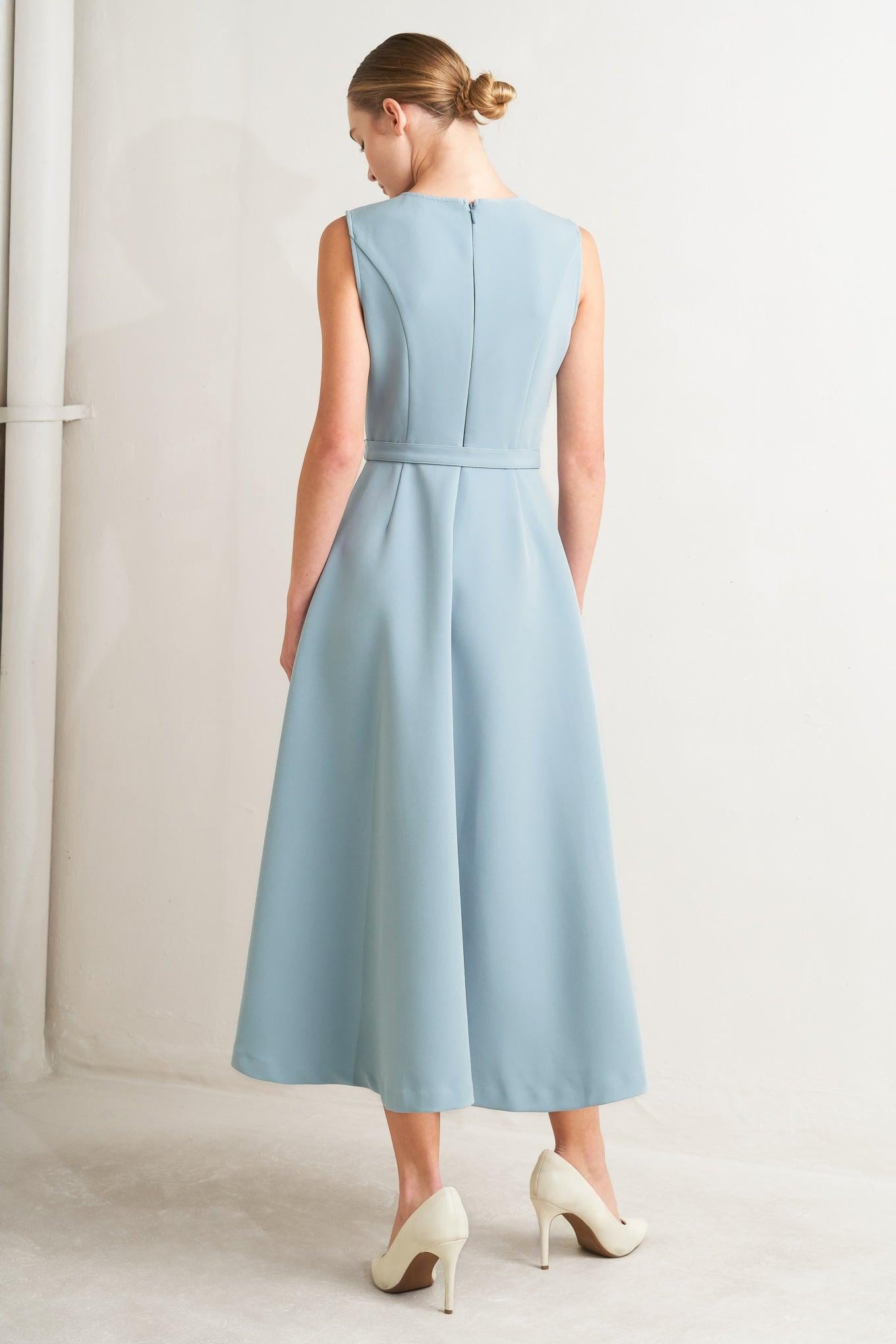 A solid woven midi dress featuring round neckline, sleeveless, pintuck front, self belt, circle skirt and back zipper closure
Details:
Self: 96% Polyester 4% Spandex
Lining: 100% Polyester
Size & Fit
-Model is 5`8" And Wearing Size Small
-Measurements Taken From Size Small
-Approx. Length: 50"