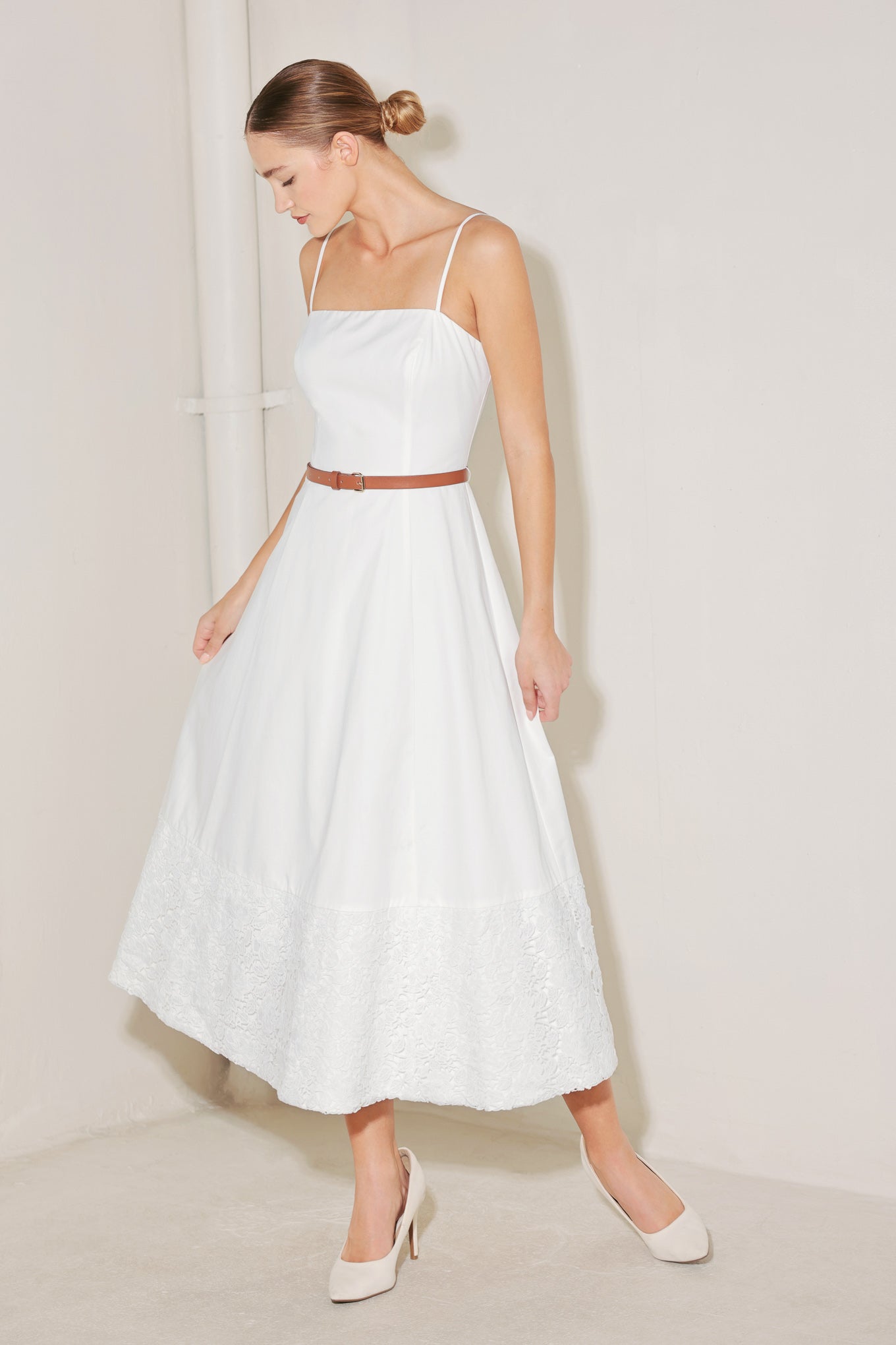 A solid woven midi dress featuring straight neckline, straps, contrasting belt, lace hem and back zipper closure
Details:
Self : 100% Cotton
Contrast : 100% Polyester
Lining : 100% Polyester
Size & Fit
- Model is 5`8" And Wearing Size Small
- Measurements Taken From Size Small
- Approx. Length: 50"