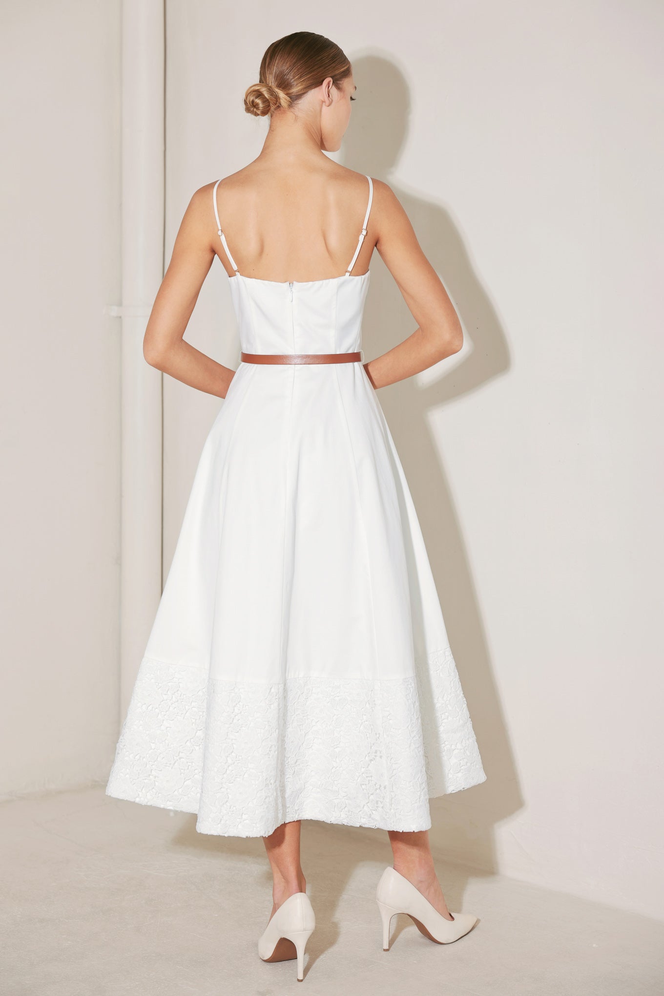 A solid woven midi dress featuring straight neckline, straps, contrasting belt, lace hem and back zipper closure
Details:
Self : 100% Cotton
Contrast : 100% Polyester
Lining : 100% Polyester
Size & Fit
- Model is 5`8" And Wearing Size Small
- Measurements Taken From Size Small
- Approx. Length: 50"