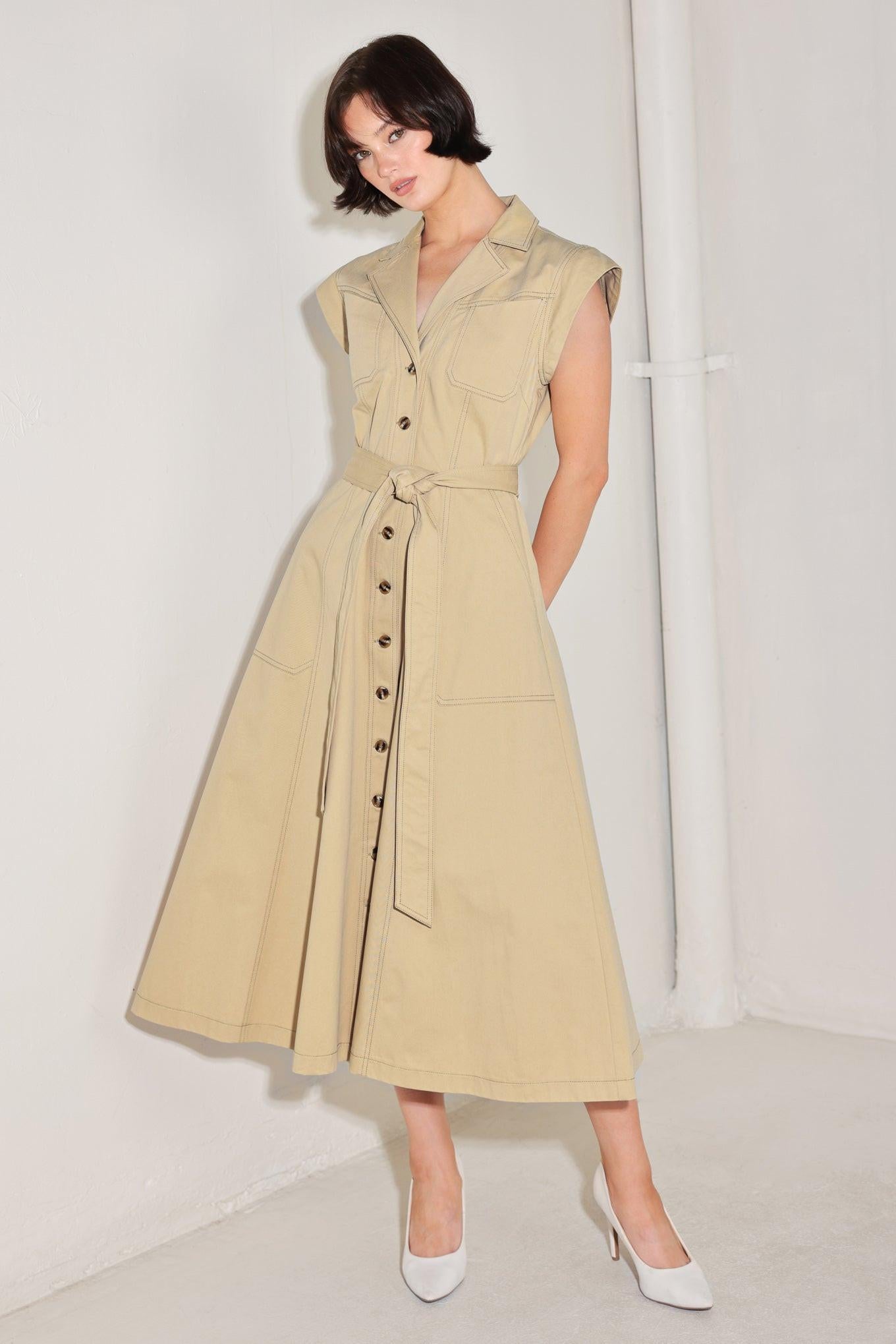 A solid woven midi dress featuring collar, cap sleeve, pockets, button down, self sash tie and circle skirt
Details:
Self : 100% Cotton
Size & Fit
- Model is 5`8" And Wearing Size Small
- Measurements Taken From Size Small
- Approx. Length: 49"