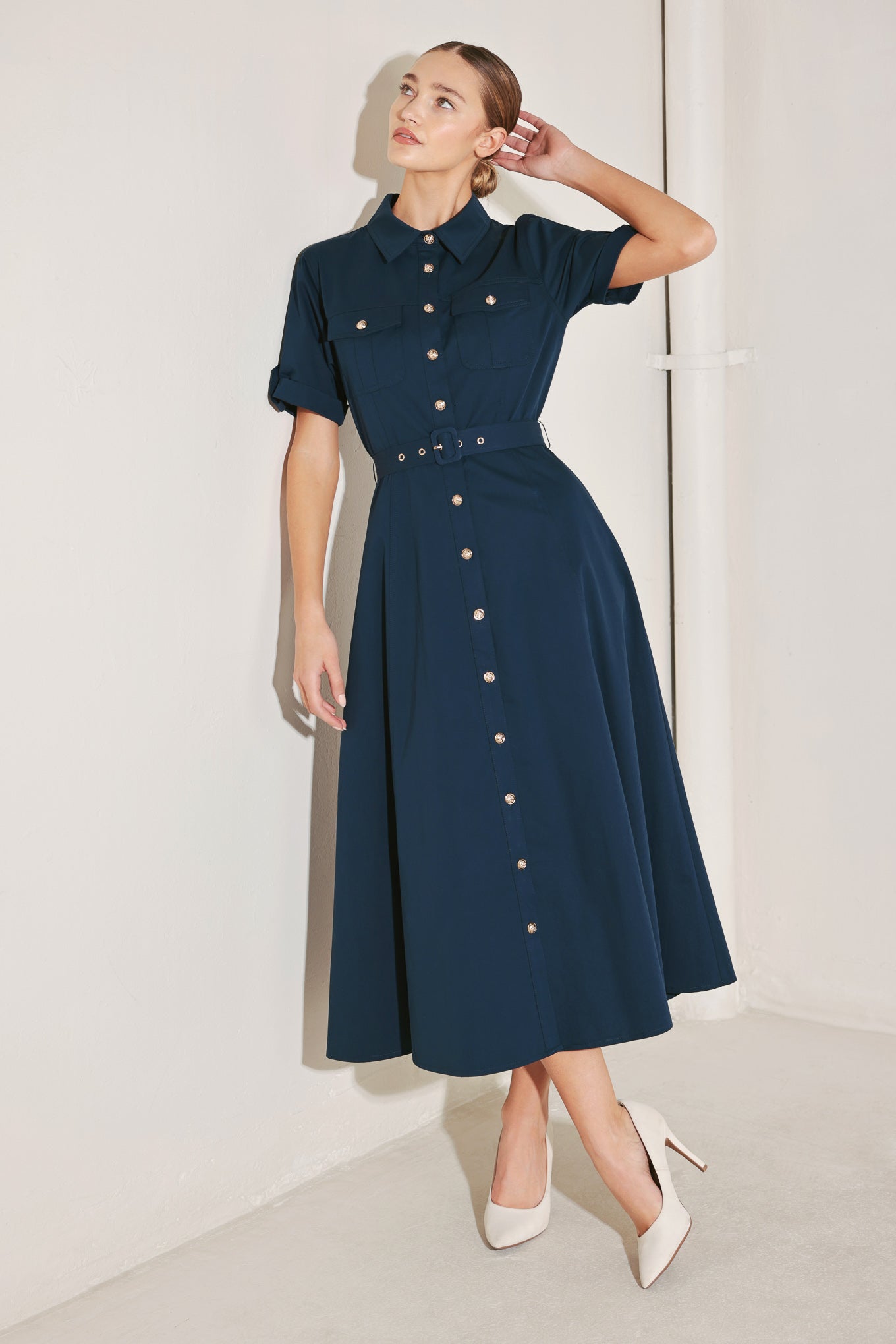 A solid woven midi dress featuring collar, cuffed short sleeve, front button down, self belt and circle skirt
Details:
Self : 100% Cotton
Size & Fit
- Model is 5`8" And Wearing Size Small
- Measurements Taken From Size Small
- Approx. Length: 50"