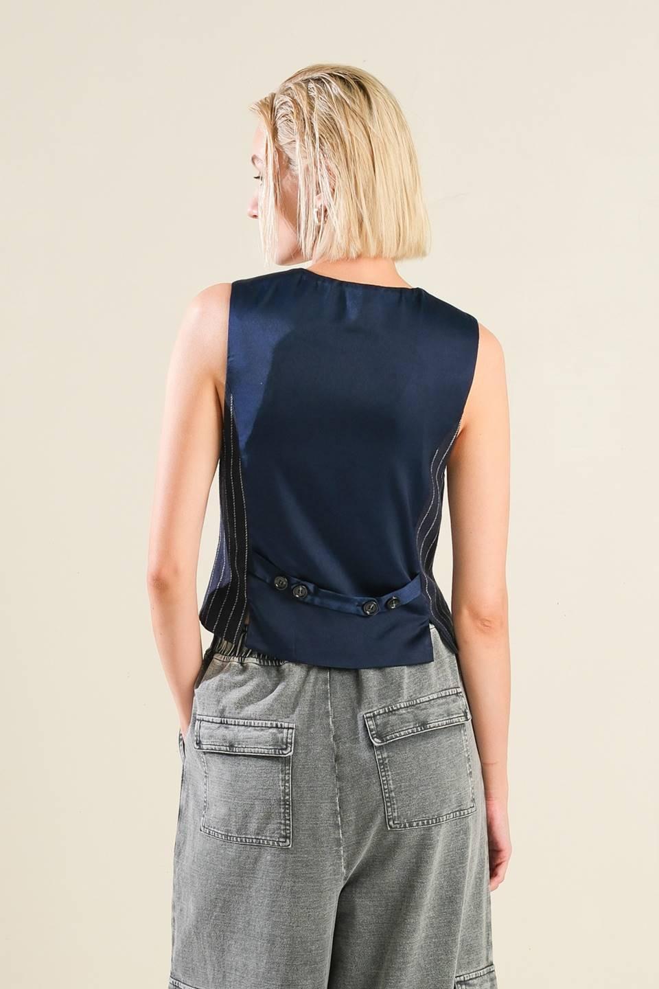 FOREVER CONNECTED WOVEN VEST.