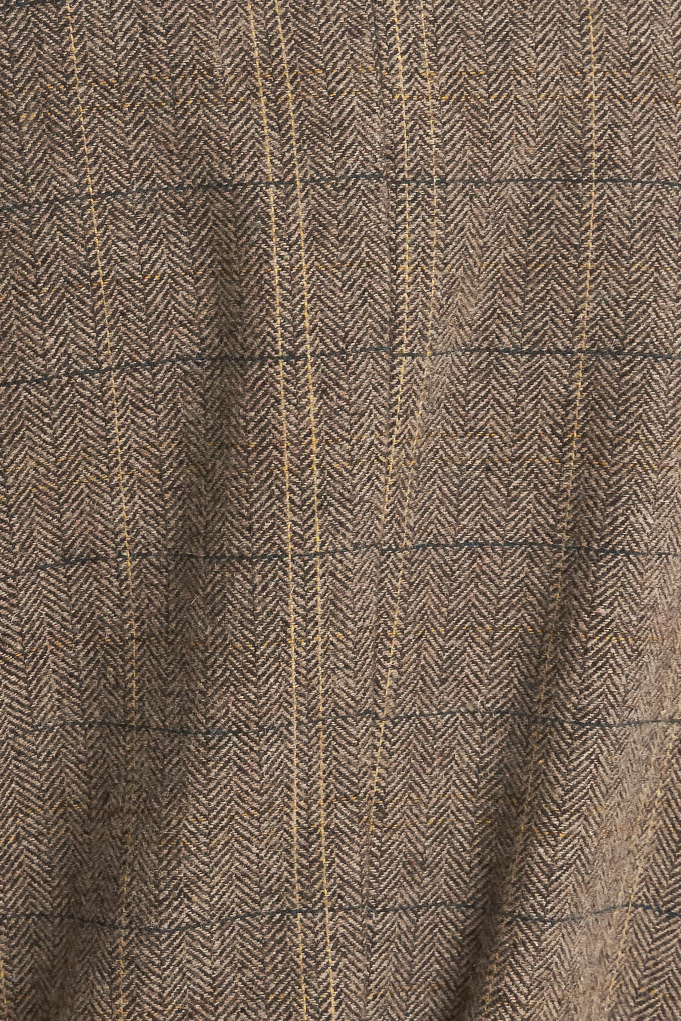 A woven midi coat featuring double breast front button closure, contrasting belt and sweater sleeve