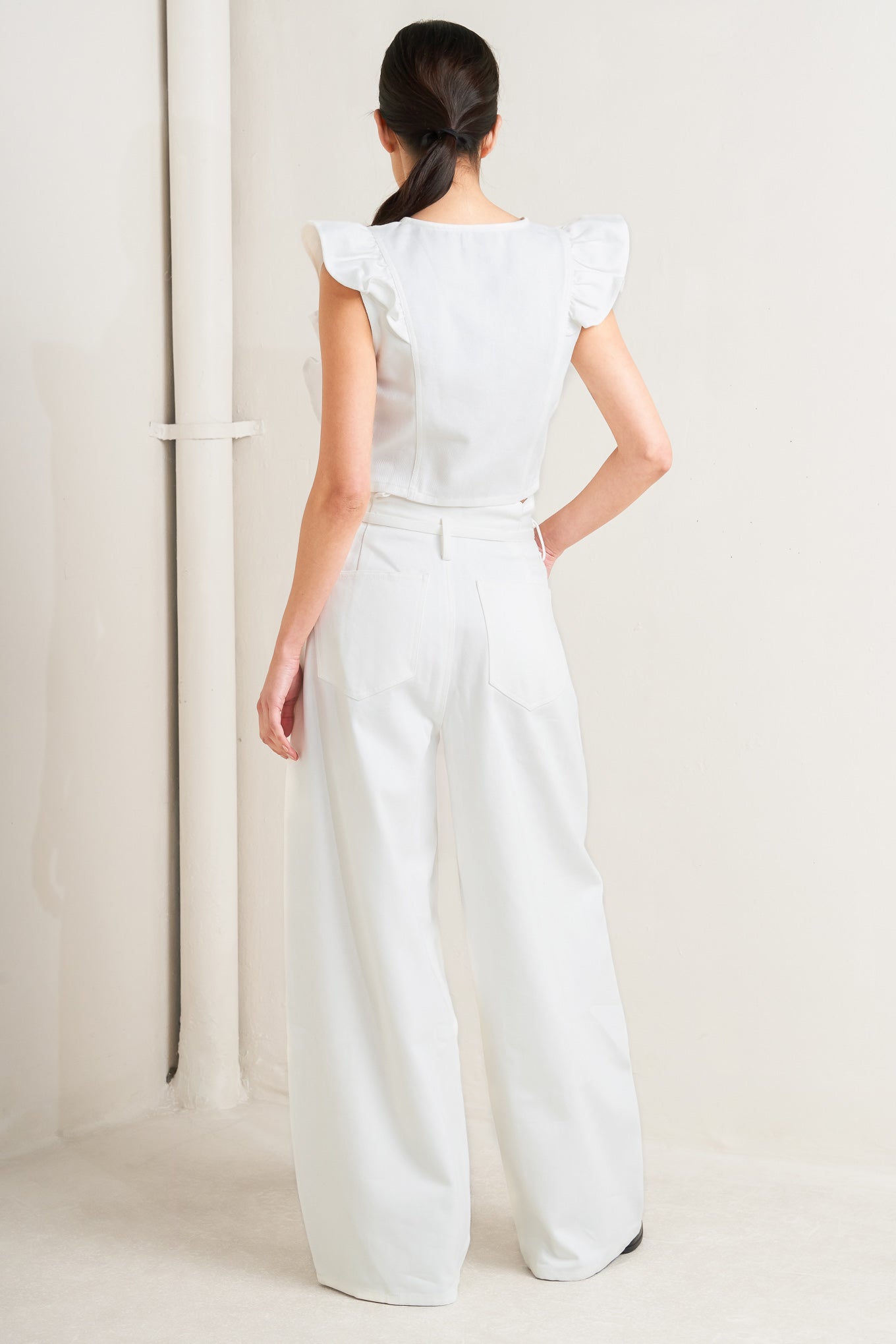 A twill top featuring round neckline with ruffle detail
Details:
Self : 100% Cotton
Size & Fit
- Model is 5`8" And Wearing Size Small
- Measurements Taken From Size Small
- Approx. Length: 17"