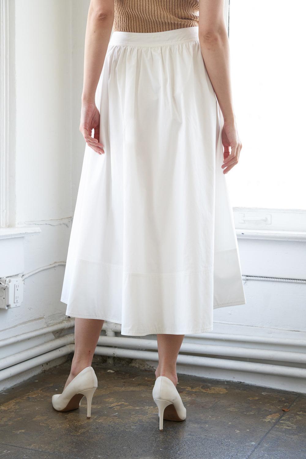 HOLDING ON TIGHT POPLIN MIDI SKIRT.