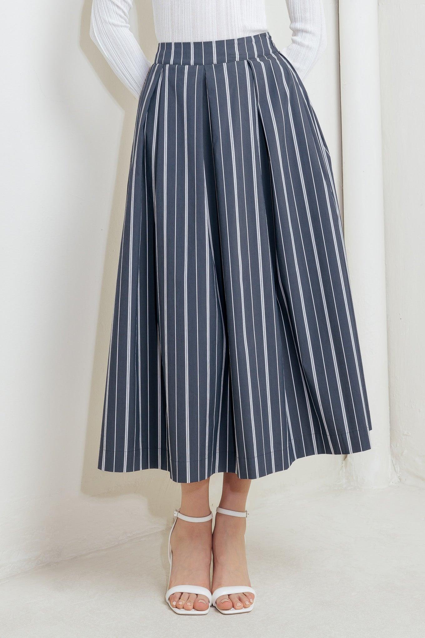 BEHIND THE GRIN WOVEN MIDI SKIRT.