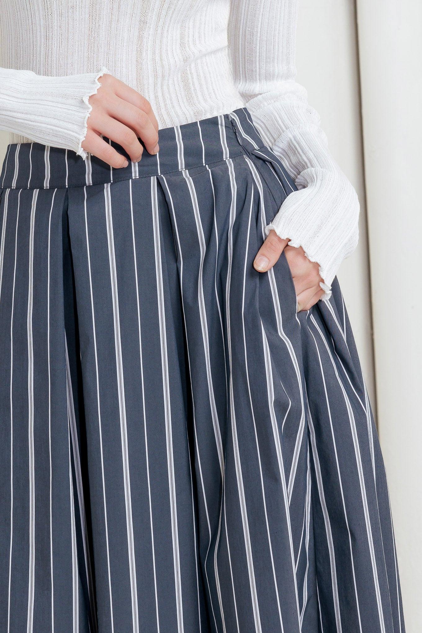 BEHIND THE GRIN WOVEN MIDI SKIRT.