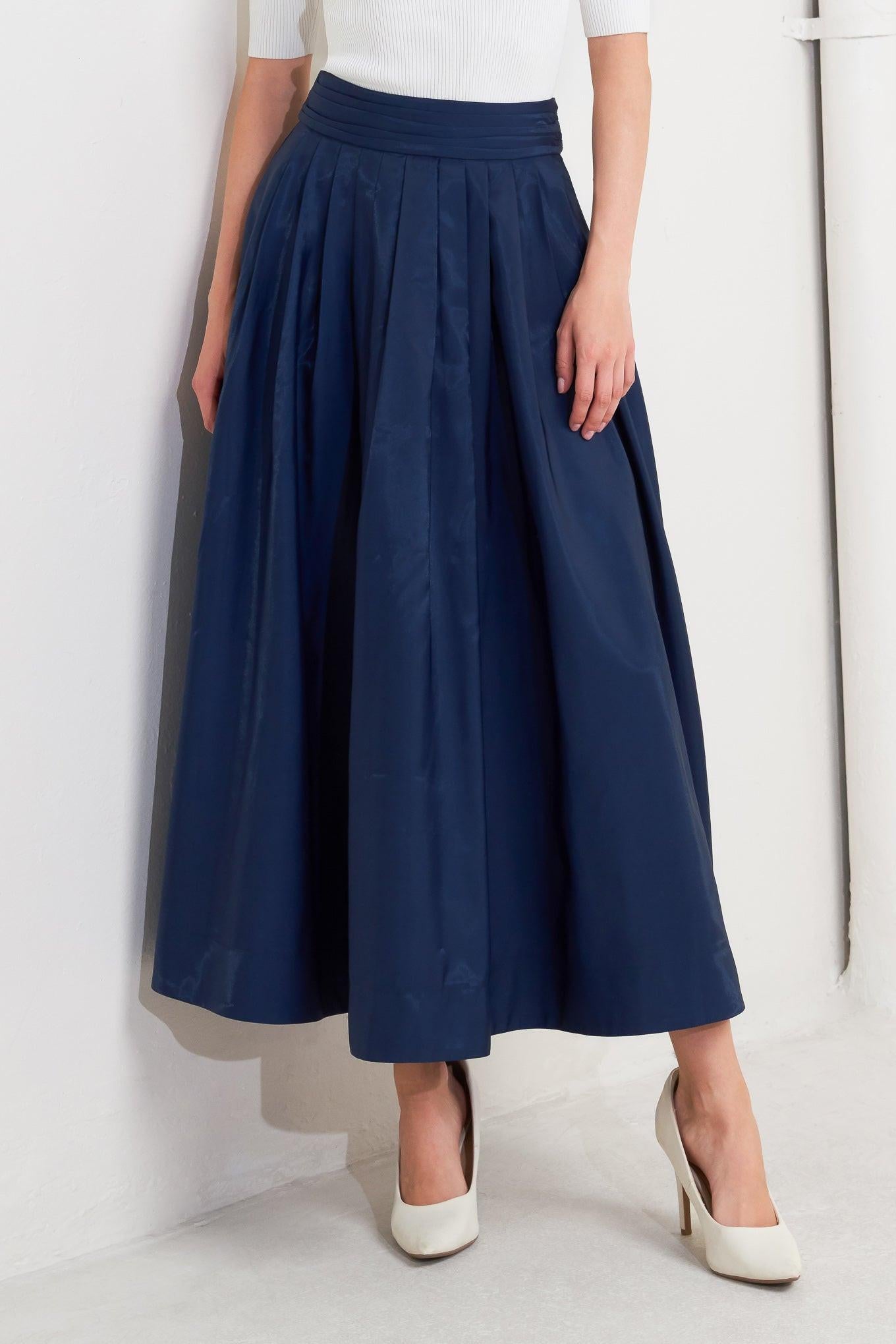 LUXE FLARE WOVEN PLEATED MIDI SKIRT.