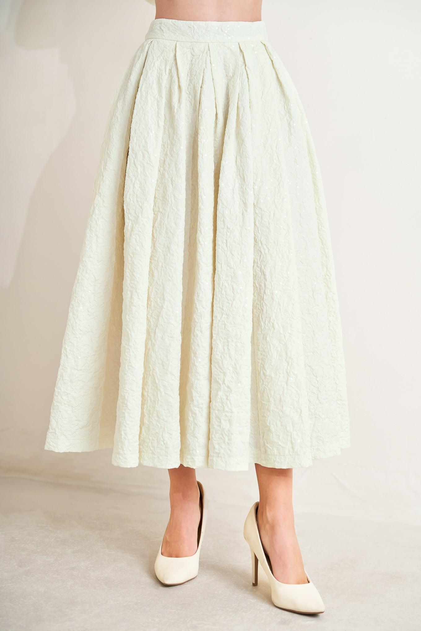 A textured woven full skirt with back zipper closure. Matching top FT1754S
Details:
Self : 100% Polyester
Size & Fit
- Model is 5`8" And Wearing Size Small
- Measurements Taken From Size Small
- Approx. Length: 36"
