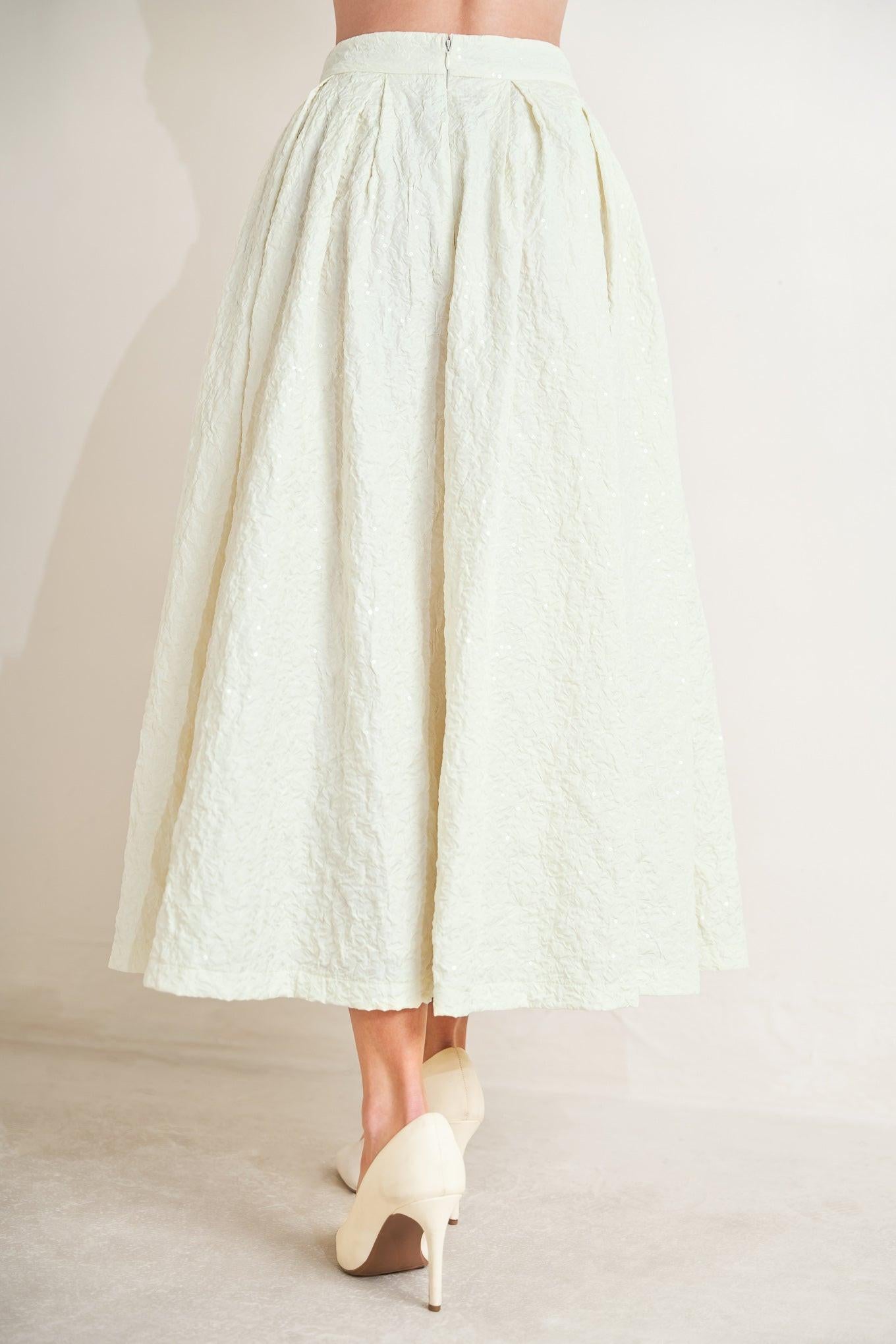 A textured woven full skirt with back zipper closure. Matching top FT1754S
Details:
Self : 100% Polyester
Size & Fit
- Model is 5`8" And Wearing Size Small
- Measurements Taken From Size Small
- Approx. Length: 36"