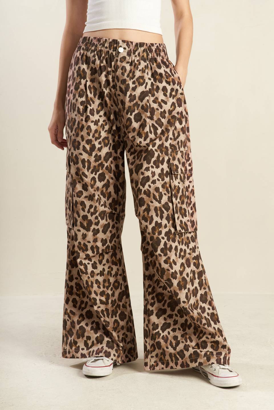 A printed woven pant featuring a front closure. Comes with matching jacket FJ1144.