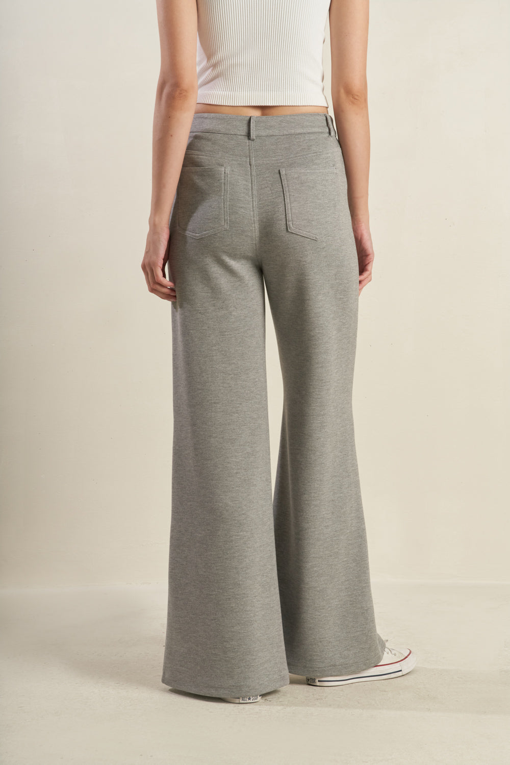 A solid woven pant with front closure, pockets and flare leg. Matching top FT1351
Details:
Self : 46% Rayon 49% Polyester 5% Spandex 
Size & Fit
- Model is 5`8" And Wearing Size Small
- Measurements Taken From Size Small
- Approx. Length: 42" Inseam- 30"