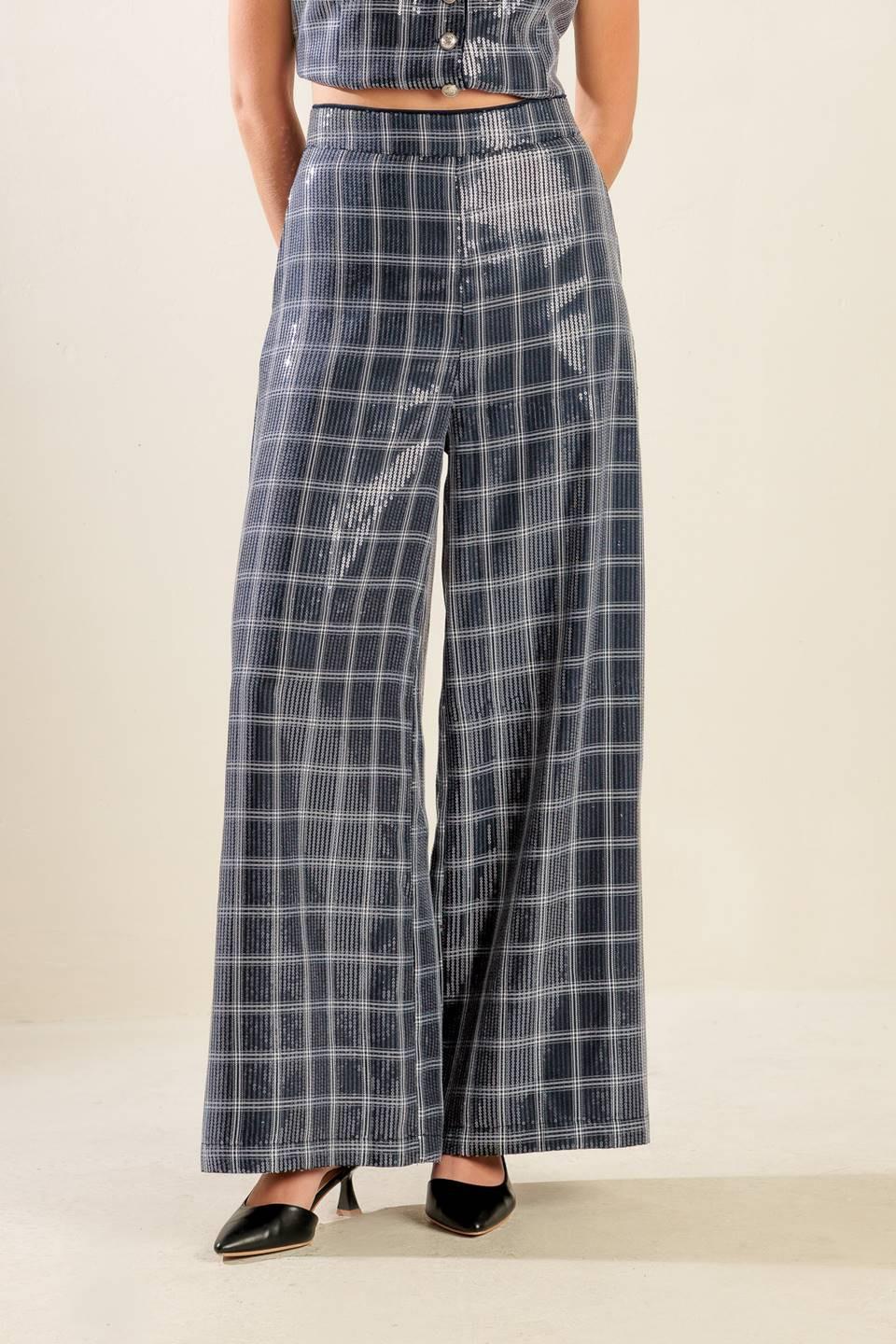 TRAVELING FAR NAVY SEQUIN PANTS.