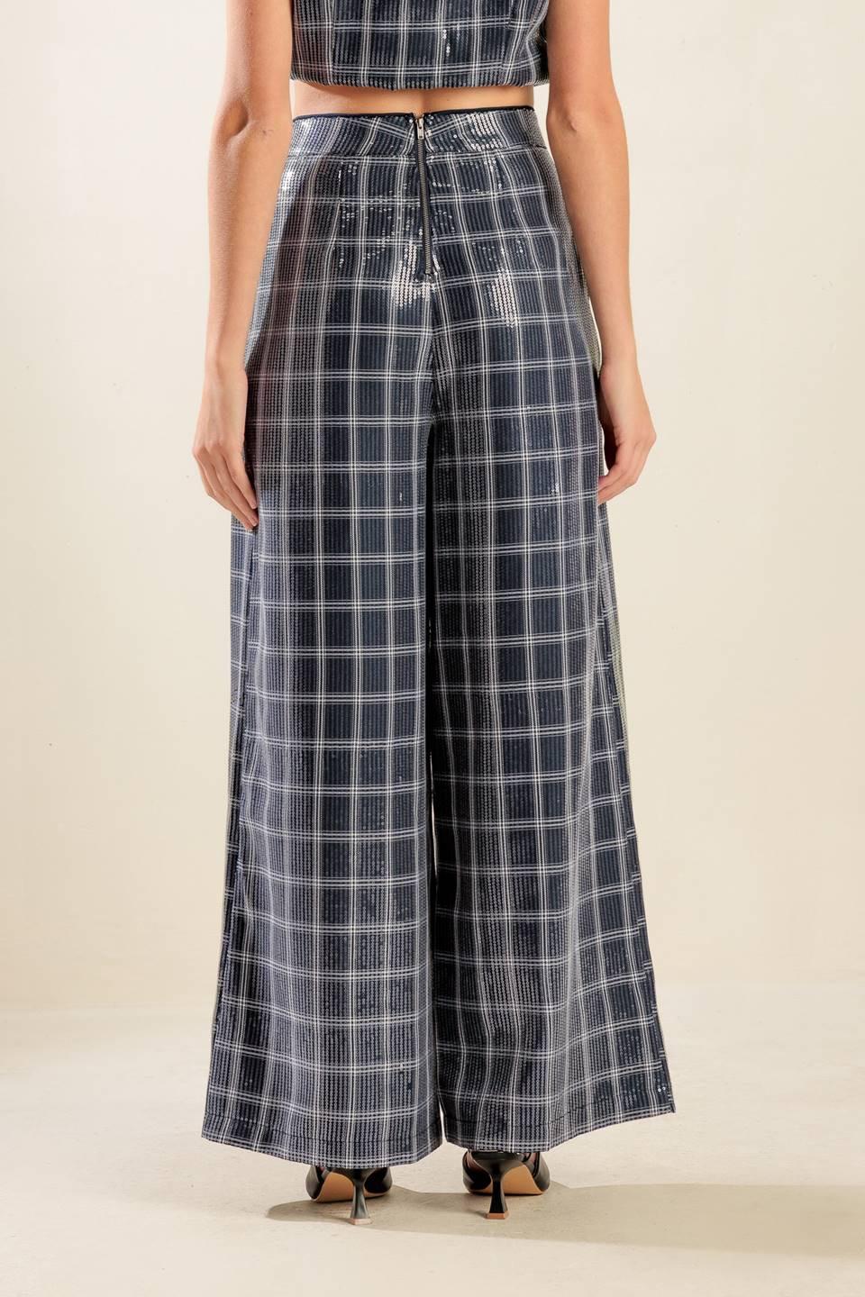 TRAVELING FAR NAVY SEQUIN PANTS.