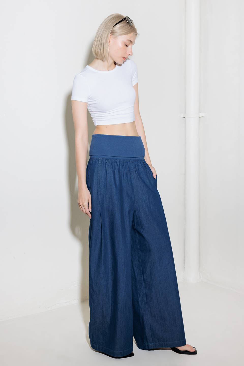 A chambray pant/jumpsuit 2fer with ribbed band and side pocket.