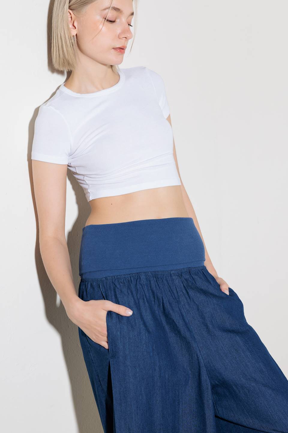 A chambray pant/jumpsuit 2fer with ribbed band and side pocket.