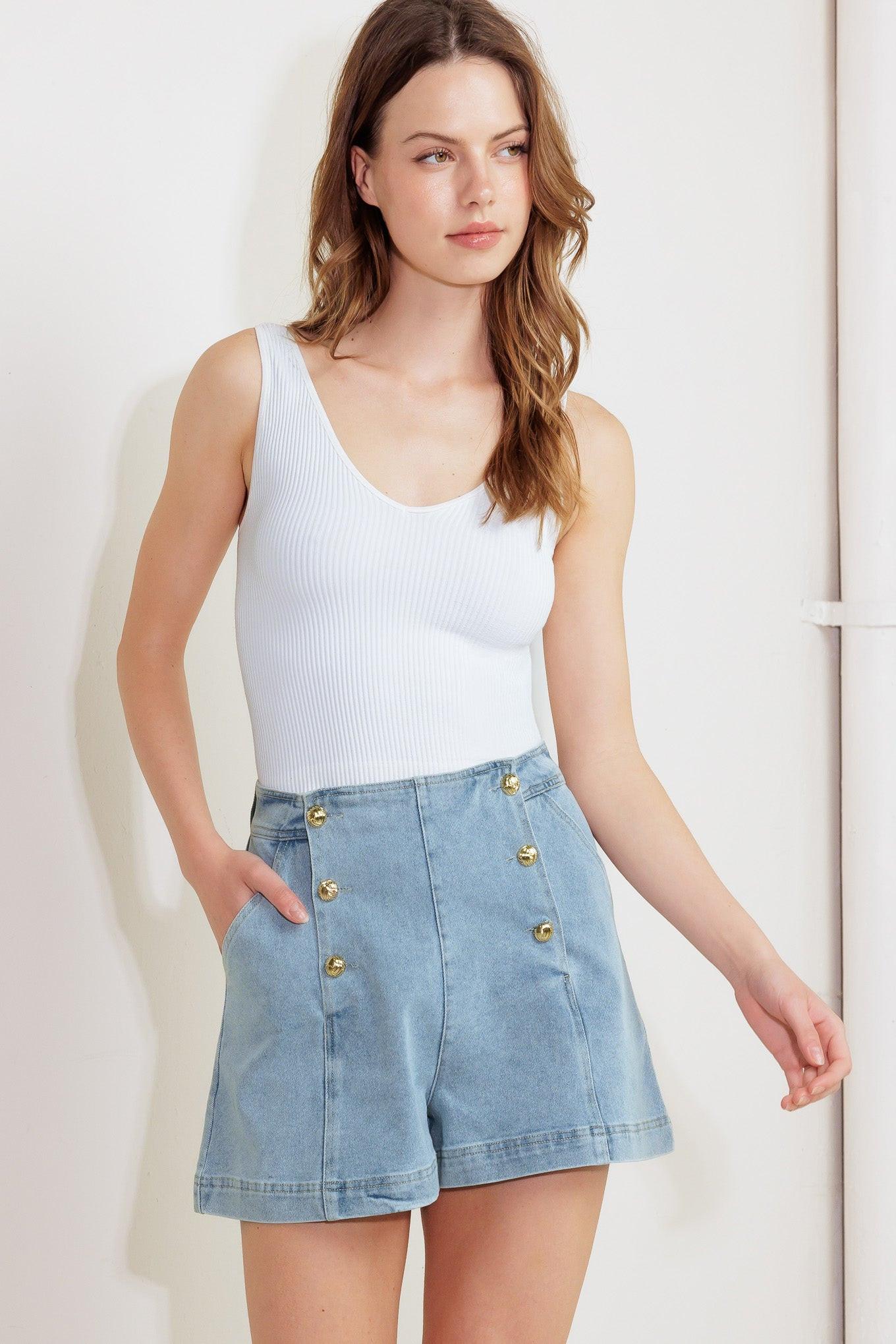 A washed denim short featuring double button down front closure and side pockets.
Matching top FT1545
Details:
Self : 85% Cotton 14% Polyester 1% Spandex
Size & Fit
- Model is 5`8" And Wearing Size Small
- Measurements Taken From Size Small
- Approx. Length: 16" FLYING TOMATO