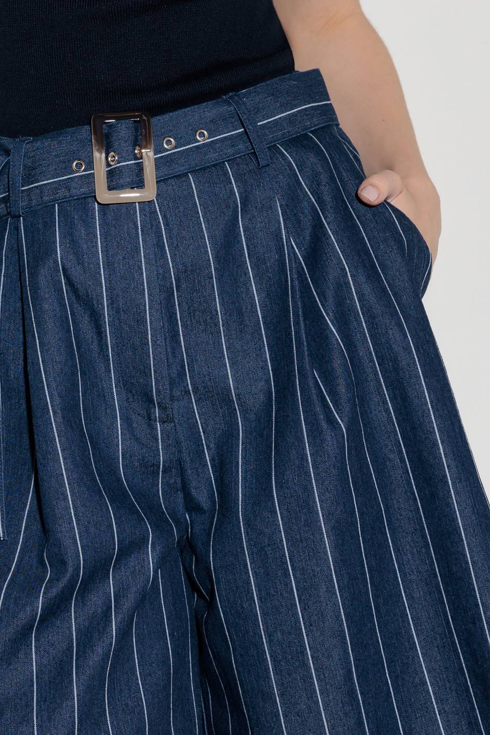 A striped woven bermuda short featuring self belt and side pocket.