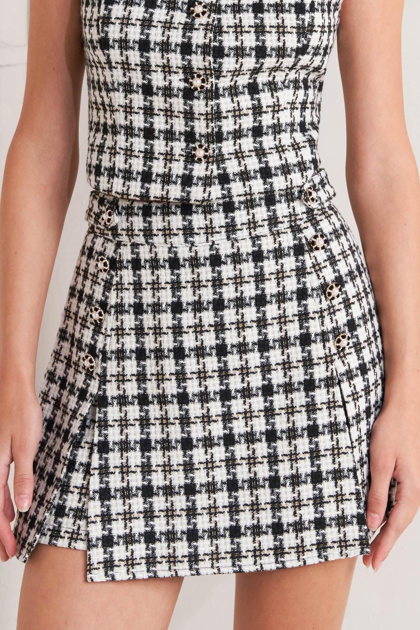 MONA CHECK TWEED SKORT.