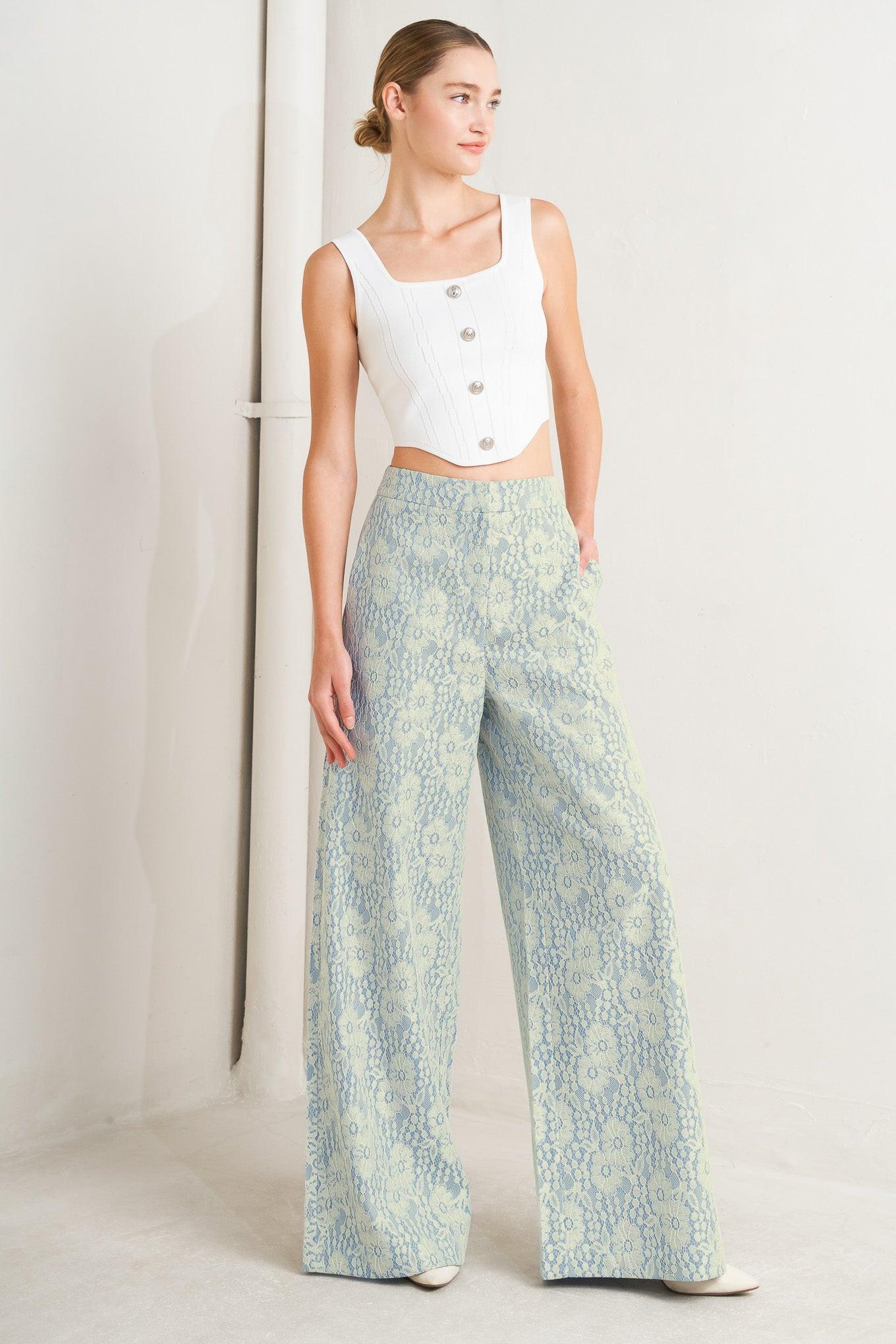 A woven bonded lace pant featuring side zipper closure and wide leg.
Details:
Self: 50% Rayon 50% Polyester
Size & Fit
-Model is 5`8" And Wearing Size Small
-Measurements Taken From Size Small
-Approx. Length: 44"