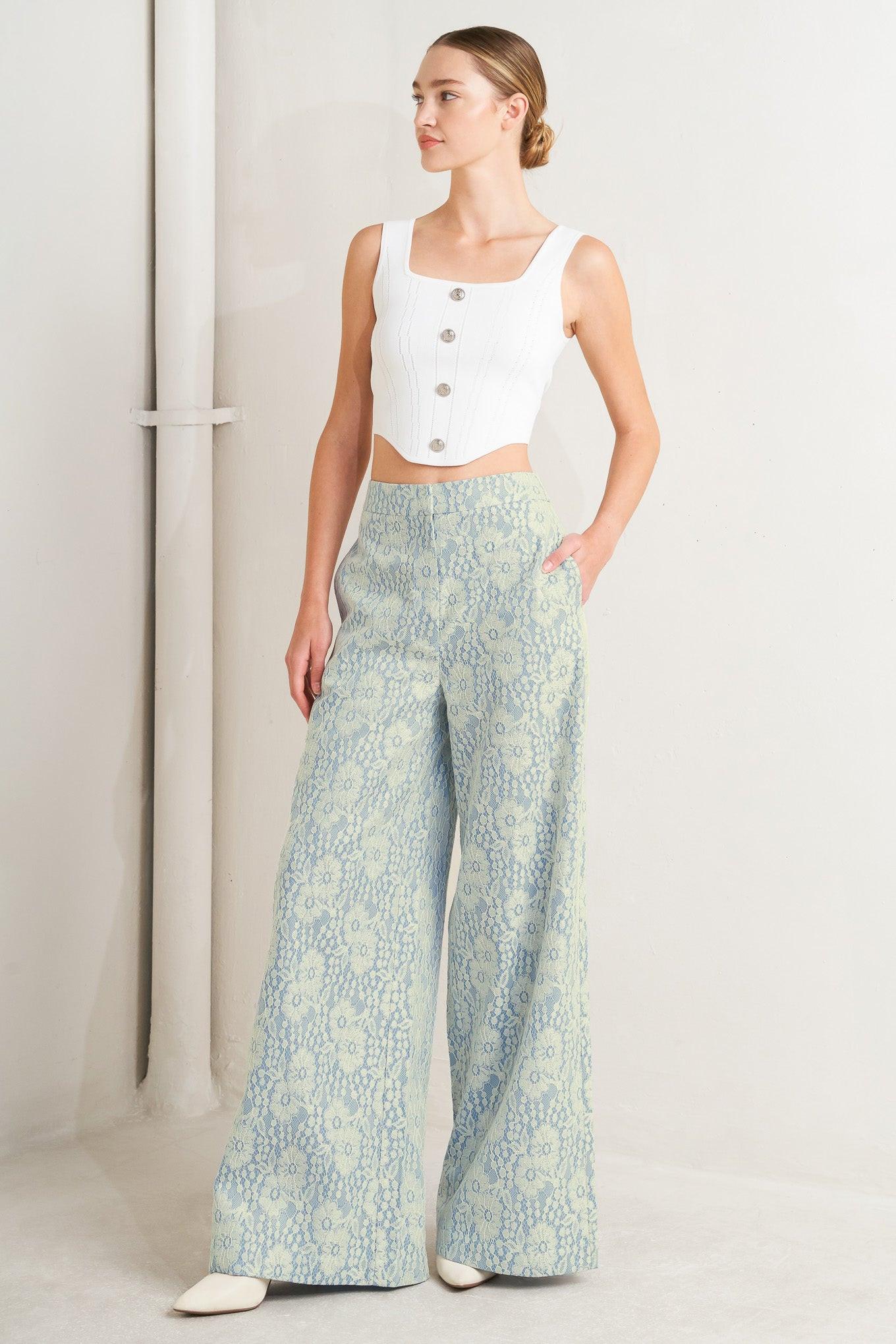 A woven bonded lace pant featuring side zipper closure and wide leg.
Details:
Self: 50% Rayon 50% Polyester
Size & Fit
-Model is 5`8" And Wearing Size Small
-Measurements Taken From Size Small
-Approx. Length: 44"