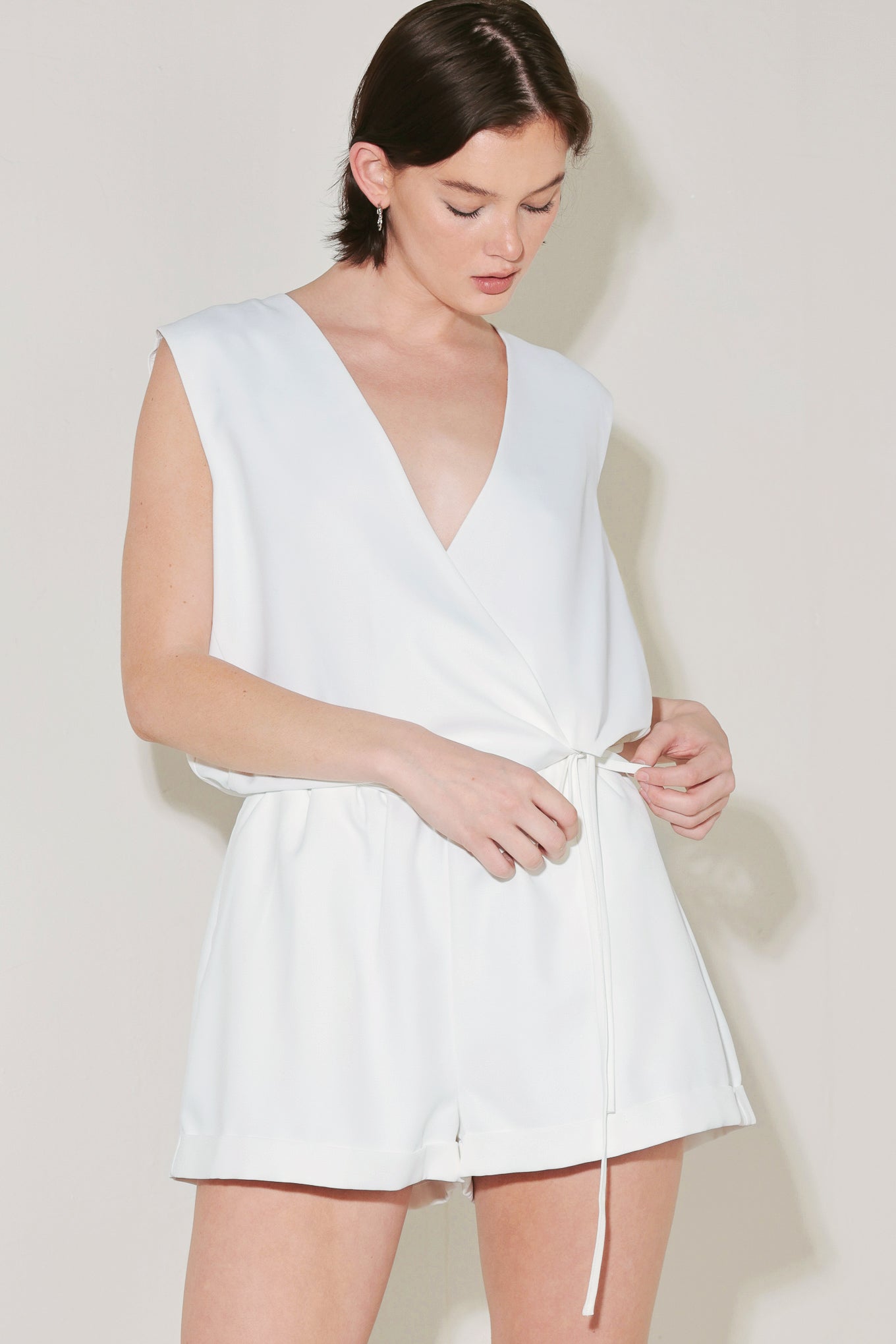 A solid woven short featuring elasticized waist and cuffed hem. Matching top FJ1359B
Details:
Self : 100% Polyester
Lining : 100% Polyester
Size & Fit
- Model is 5`8" And Wearing Size Small
- Measurements Taken From Size Small
- Approx. Length: 16"