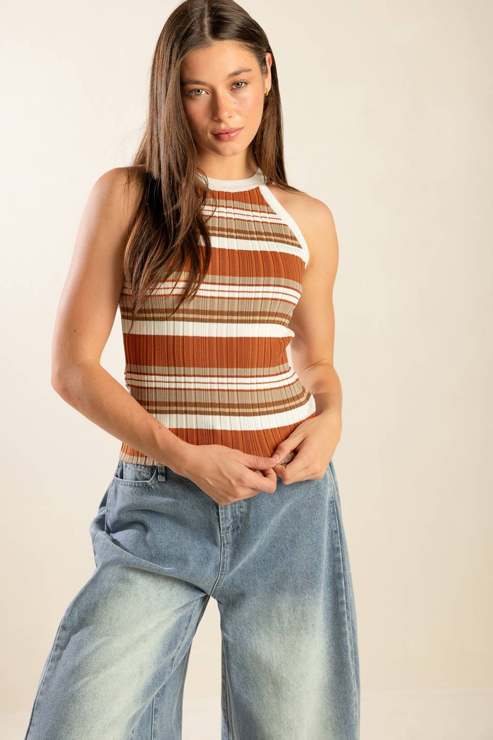 Explore your fearless side with the Anytime Now Sweater Knit Top! This ribbed top promises to provide comfort and style for any daring adventure. Get ready to conquer the day with this bold and versatile piece.