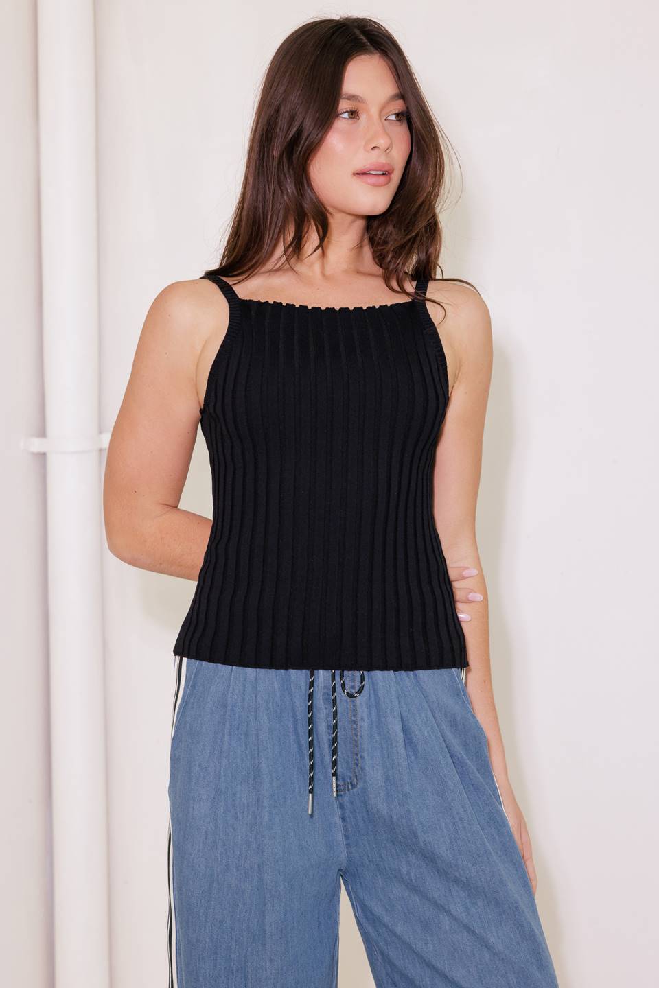 A black ribbed sweater knit tank top