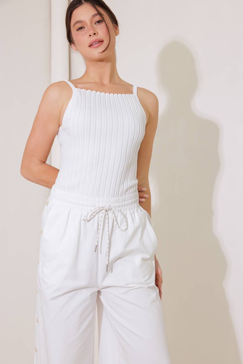 A white ribbed sweater knit tank top
