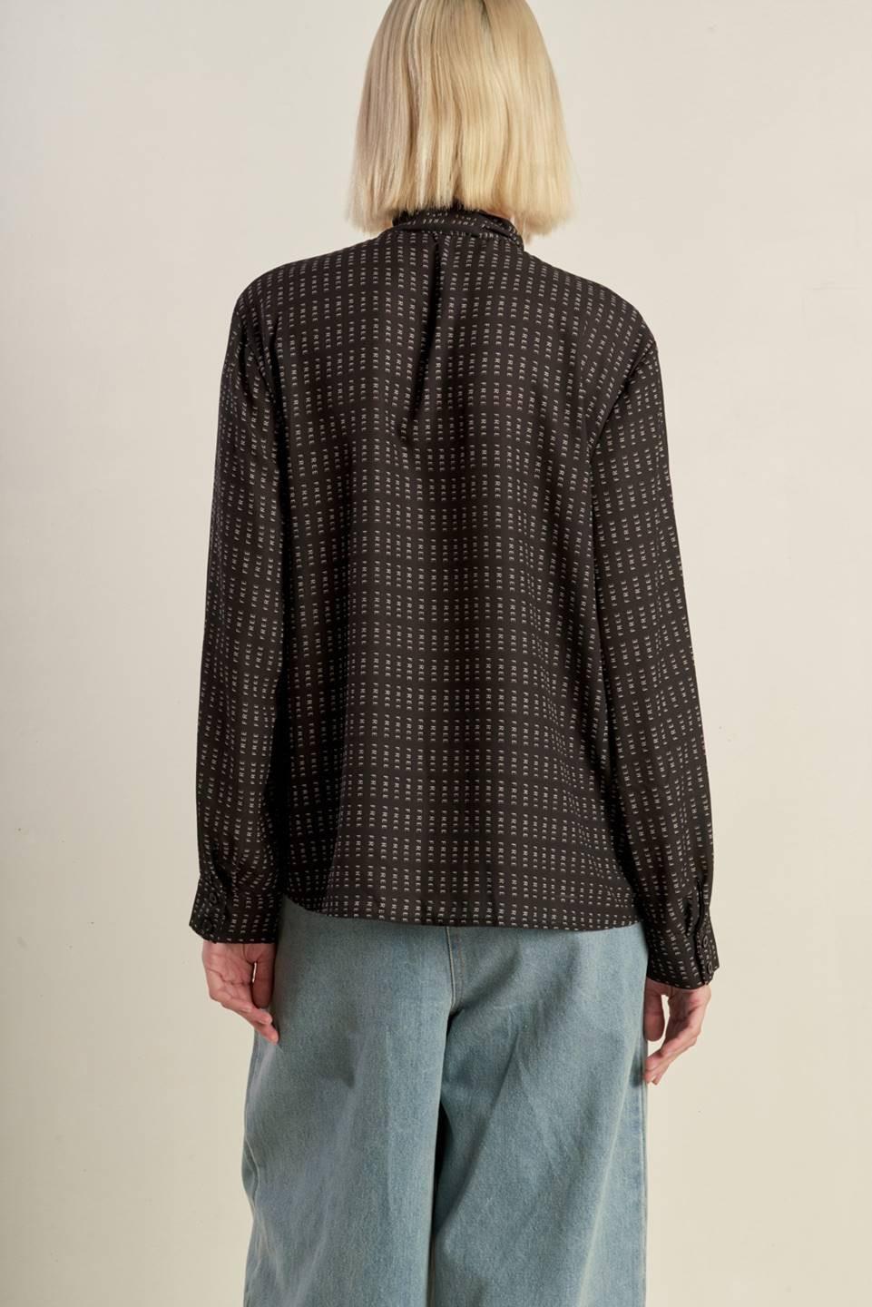 WHEREVER YOU MAY GO WOVEN TOP.
