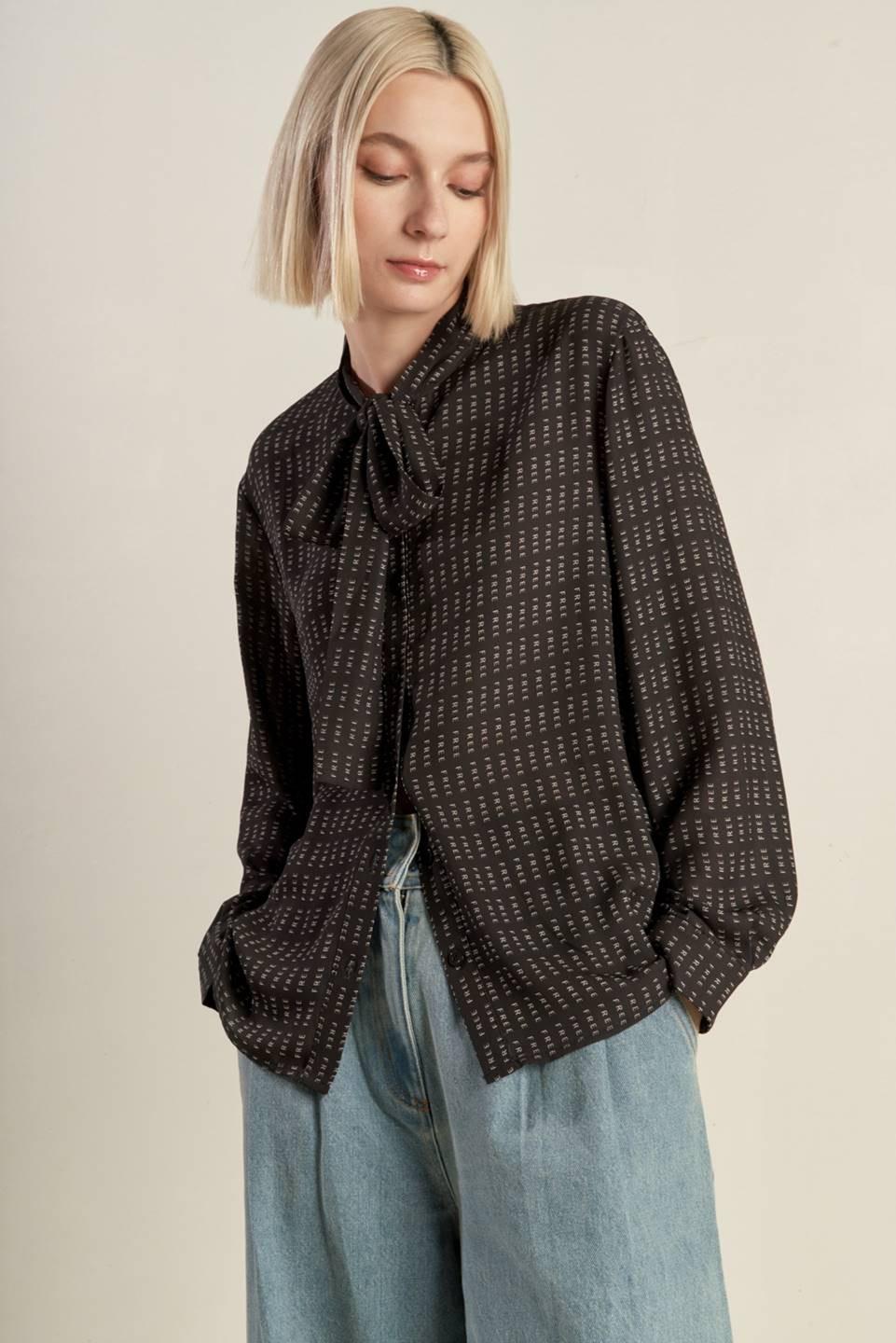 WHEREVER YOU MAY GO WOVEN TOP.