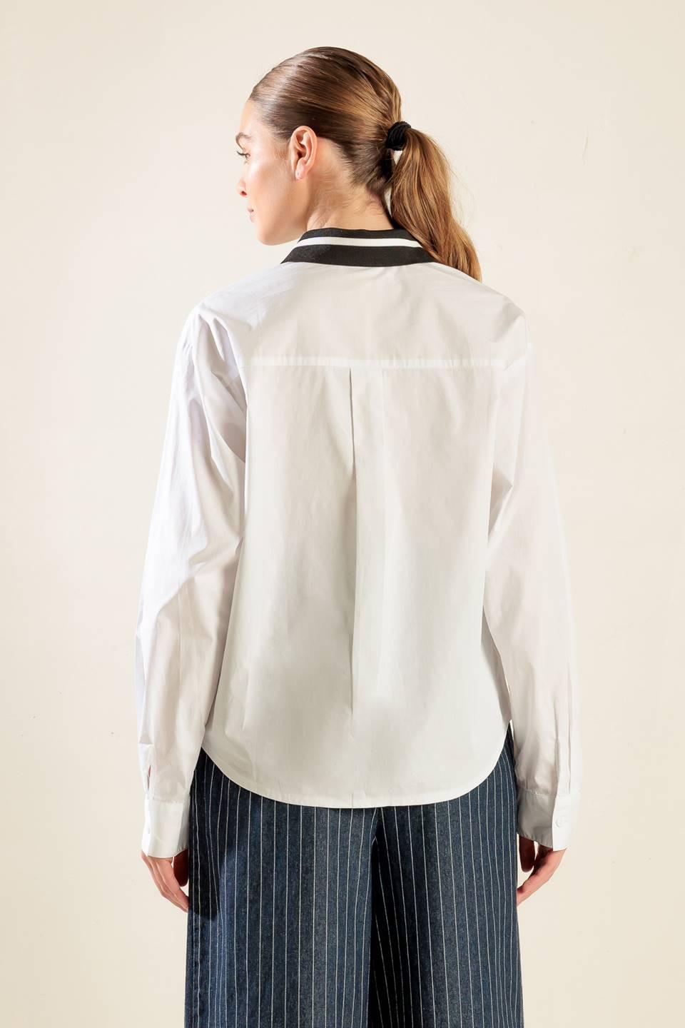 CAUSE A COMMOTION WOVEN TOP.