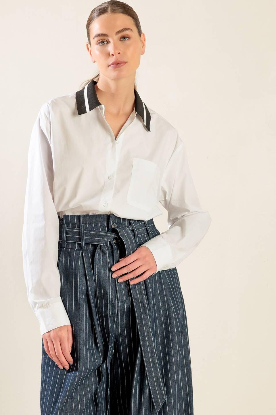 CAUSE A COMMOTION WOVEN TOP.