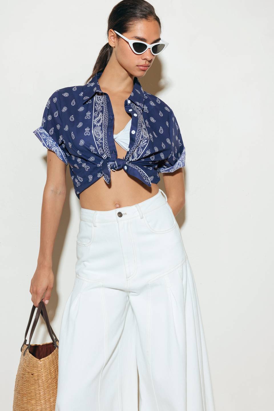 A printed navy and white woven shirt featuring collar, button down and short sleeve.