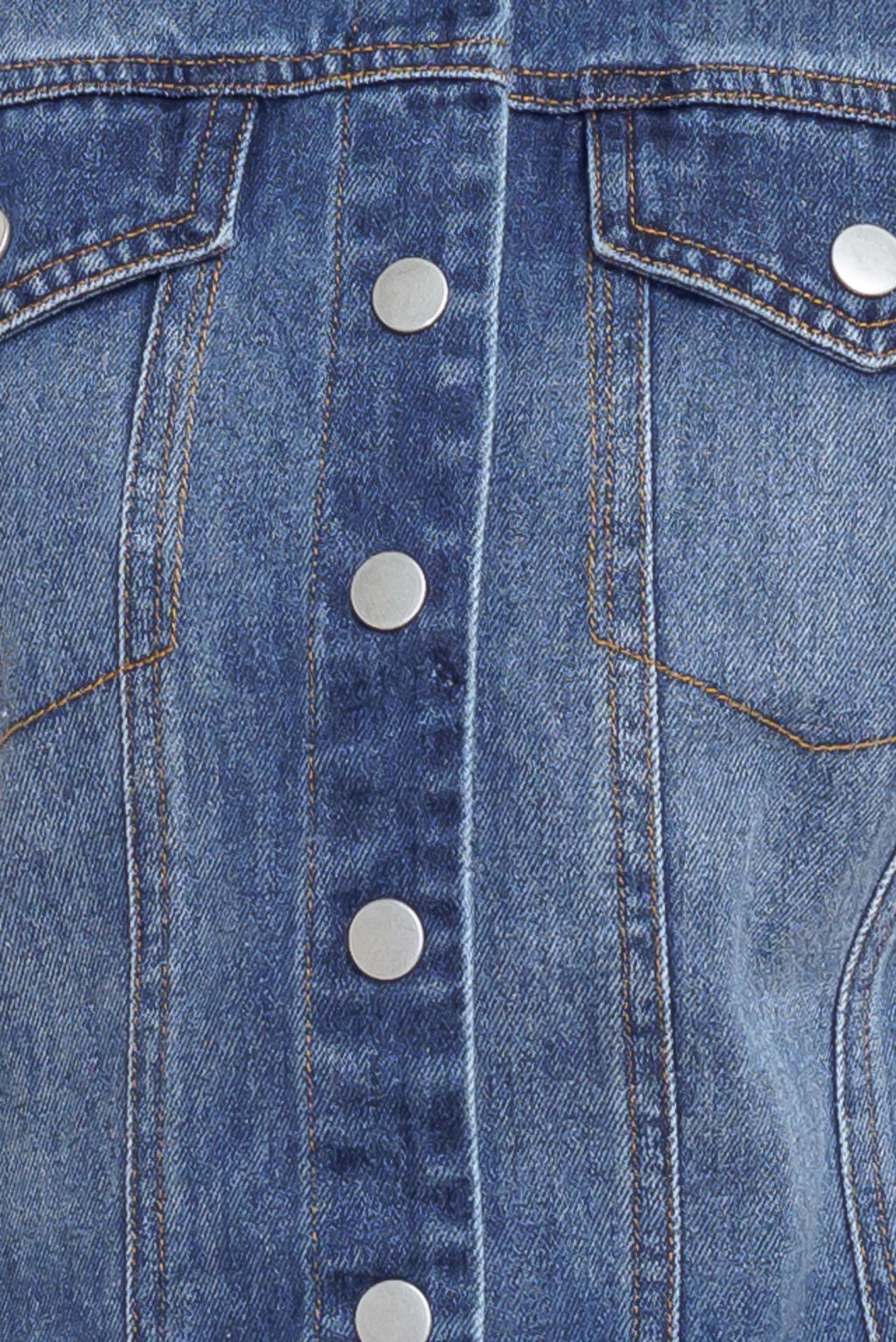 A washed denim top featuring collar, sleeveless, button down, pockets and peplum