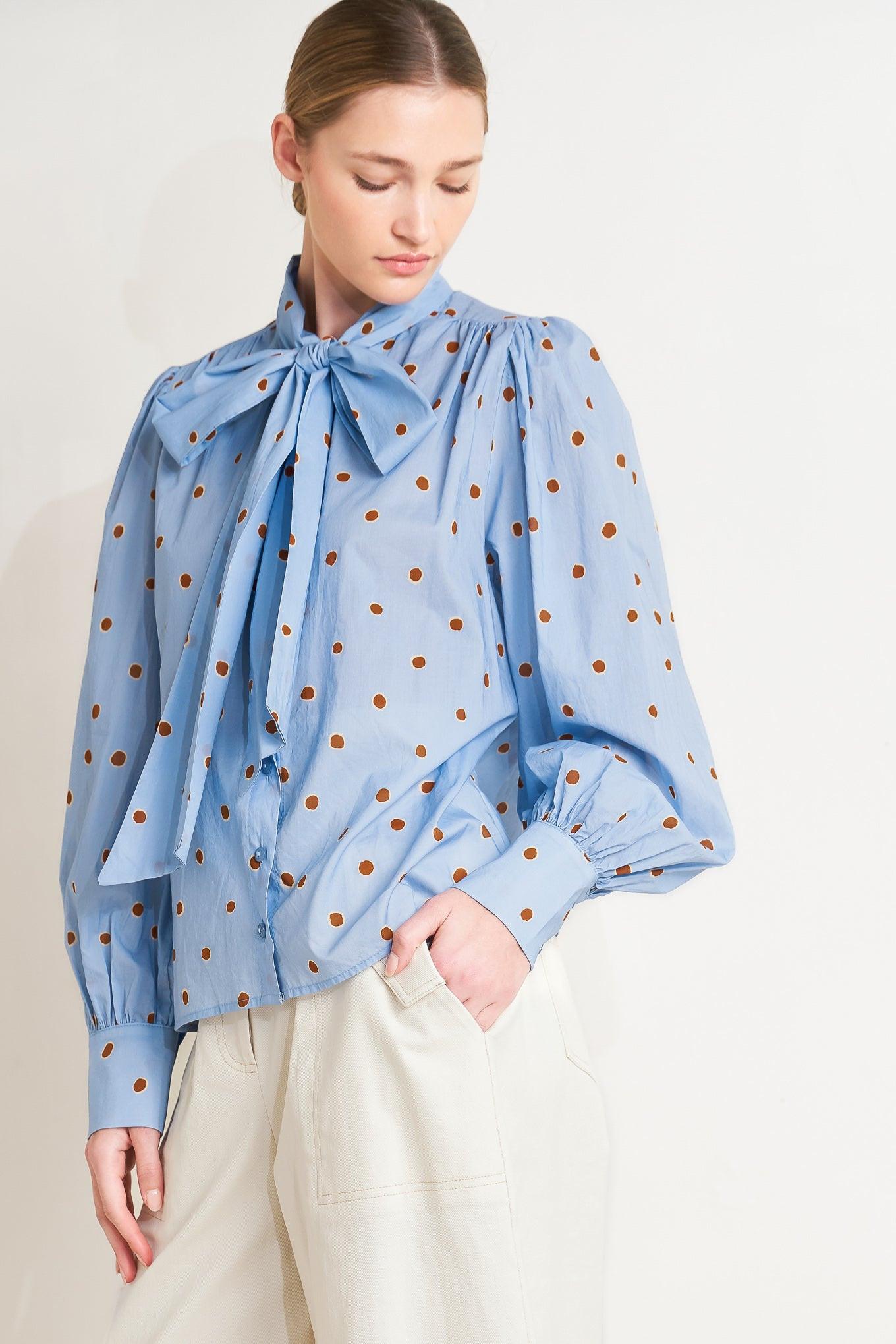 A printed woven top featuring front tie, button down and long sleeve with wide cuff
Details:
Self : 100% Cotton
Size & Fit
- Model is 5`8" And Wearing Size Small
- Measurements Taken From Size Small
- Approx. Length: 26"