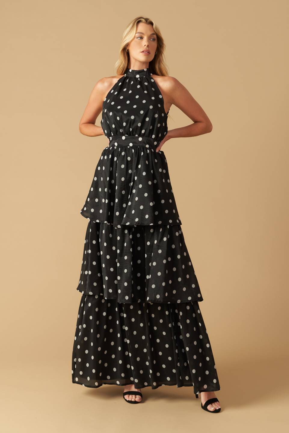 A printed woven maxi dress featuring halter neckline, layered skirt, back neck tie, split back and zipper closure
Details:
Self : 100% Polyester
Lining : 100% Polyester
Size & Fit
- Model is 5`9" And Wearing Size Small
- Measurements Taken From Size Small
- Approx. Length: 60"