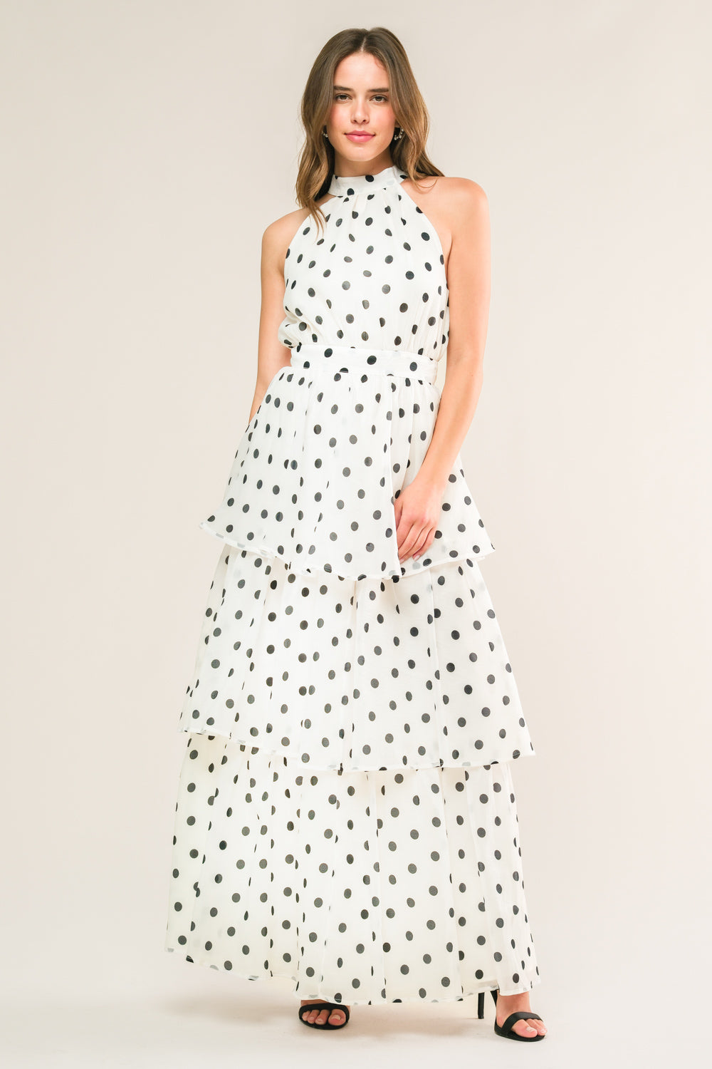 A printed woven maxi dress featuring halter neckline, layered skirt, back neck tie, split back and zipper closure
Details:
Self : 100% Polyester
Lining : 100% Polyester
Size & Fit
- Model is 5`9" And Wearing Size Small
- Measurements Taken From Size Small
- Approx. Length: 60"