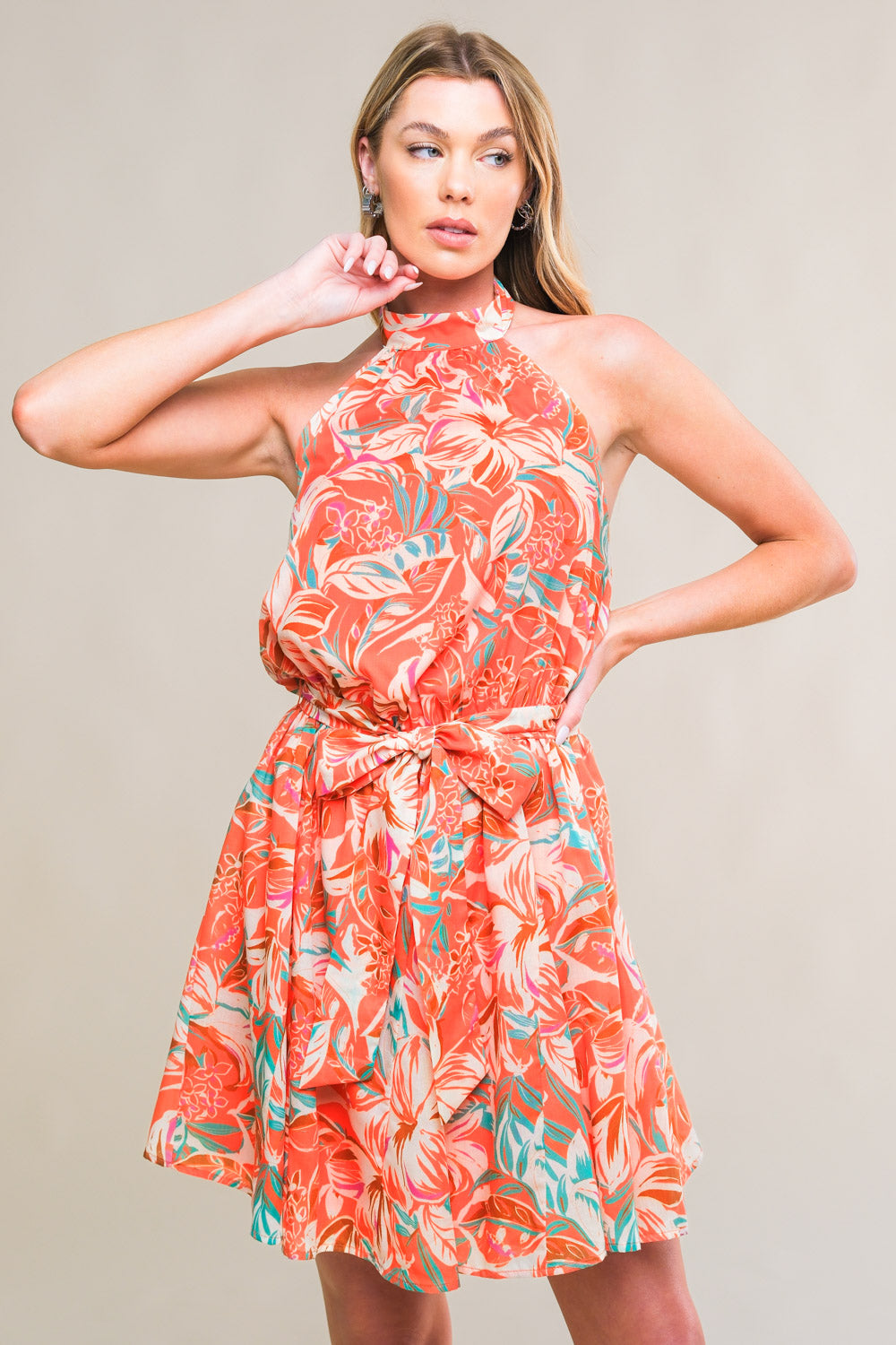 A printed woven mini dress featuring halter neckline, sleeveless, elasticized waist with self sash tie, full skirt and bare back with tie
Details:
Self : 100% Polyester
Lining : 100% Polyester
Size & Fit
- Model is 5`8" And Wearing Size Small
- Measurements Taken From Size Small
- Approx. Length: 35"