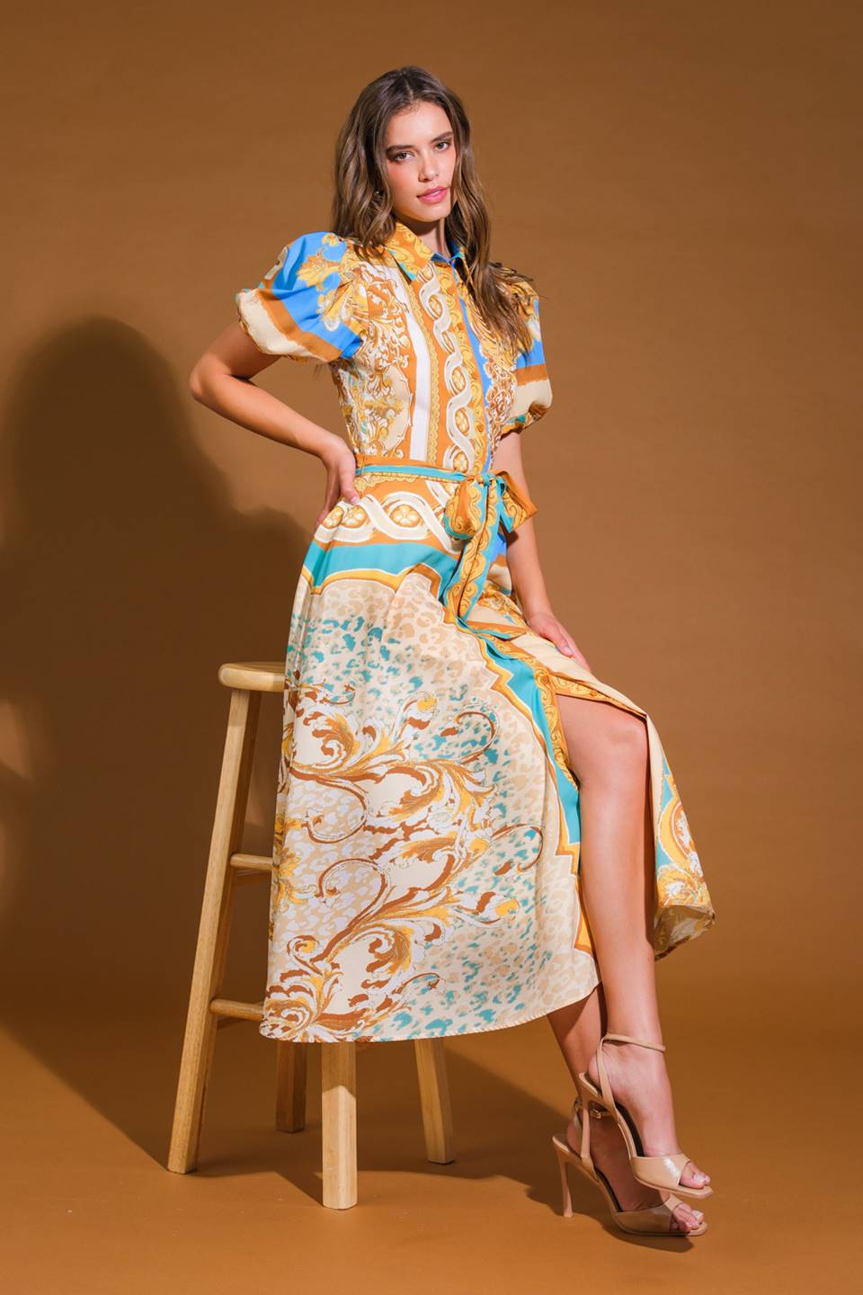 A printed woven midi dress featuring shirt collar, button down, short puff sleeve, self belt and full skirt
Details:
Self : 100% Polyester
Lining : 100% Polyester
Size & Fit
- Model is 5`9" And Wearing Size Small
- Measurements Taken From Size Small
- Approx. Length: 49"