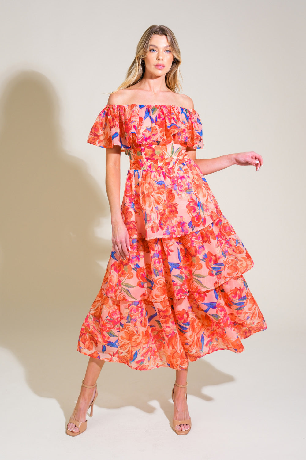 A printed woven midi dress featuring off shoulder neckline with ruffled flounce, layered skirt and back zipper closure
Details:
Self : 100% Polyester
Lining : 100% Polyester 
Size & Fit
- Model is 5`8" And Wearing Size Small
- Measurements Taken From Size Small
- Approx. Length: 50"